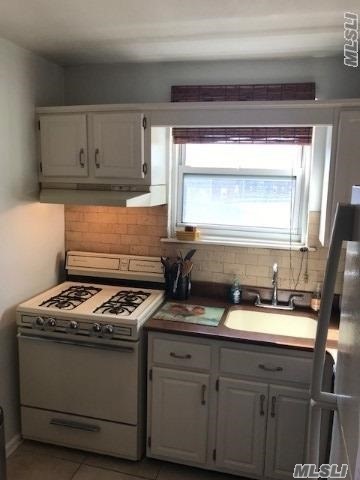 #1 photo, 245-46 77 Crescent, Bellerose , NY 11426