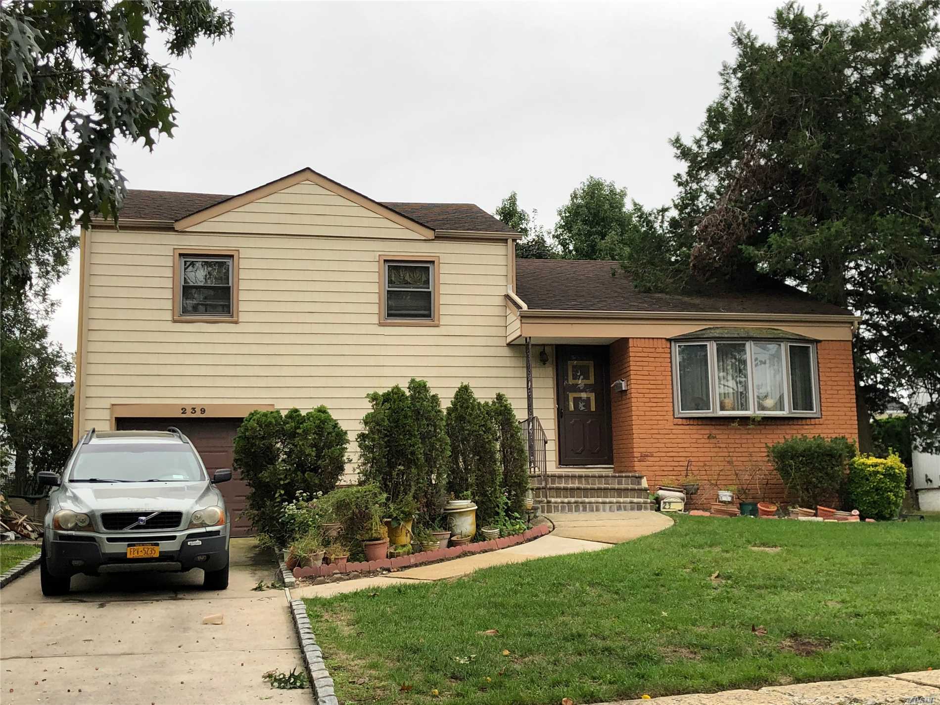 #1 photo, 239 Elmwood Avenue, Roosevelt , NY 11575