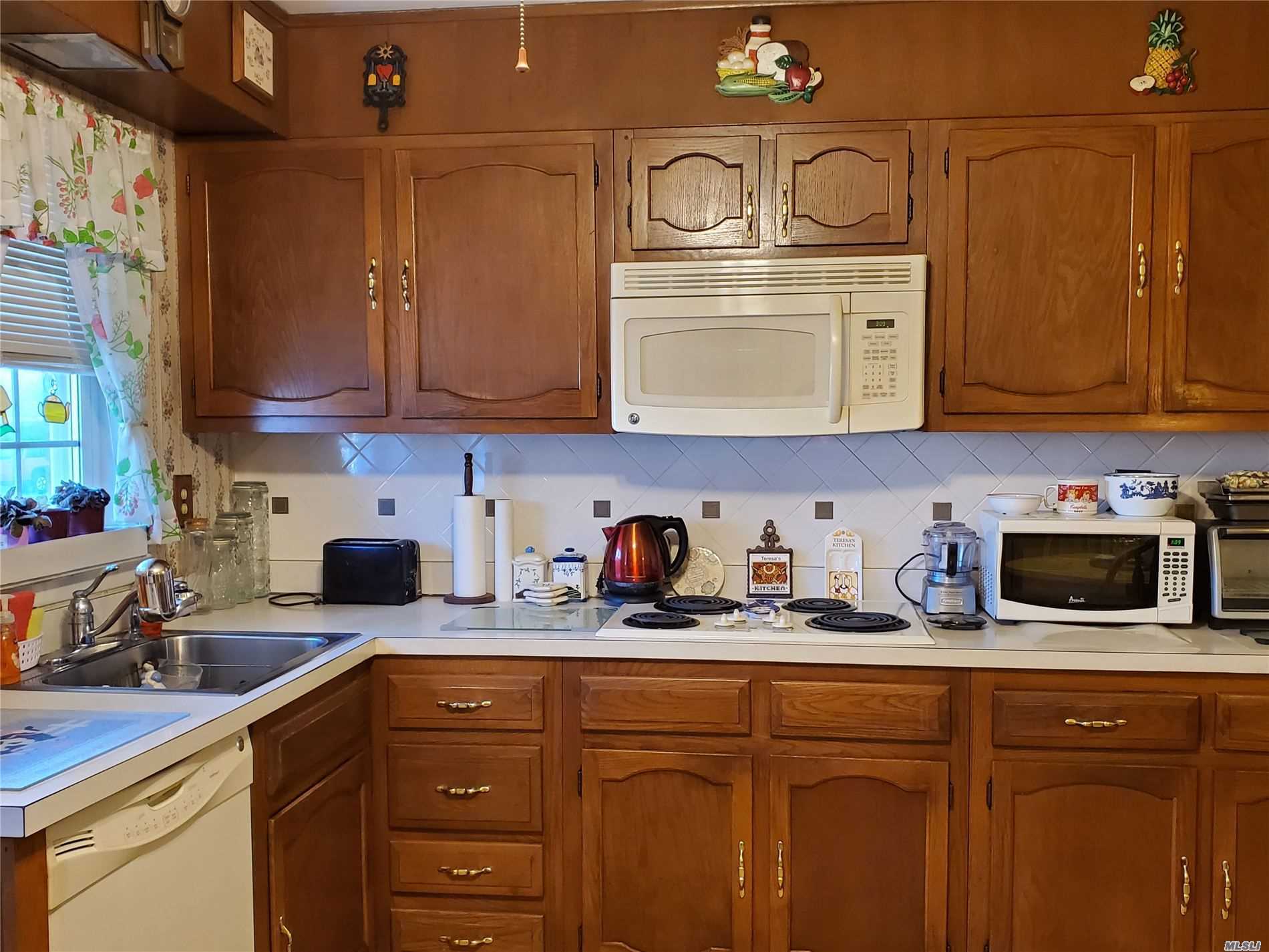 #1 photo, 297 Cardiff Court, Ridge , NY 11961