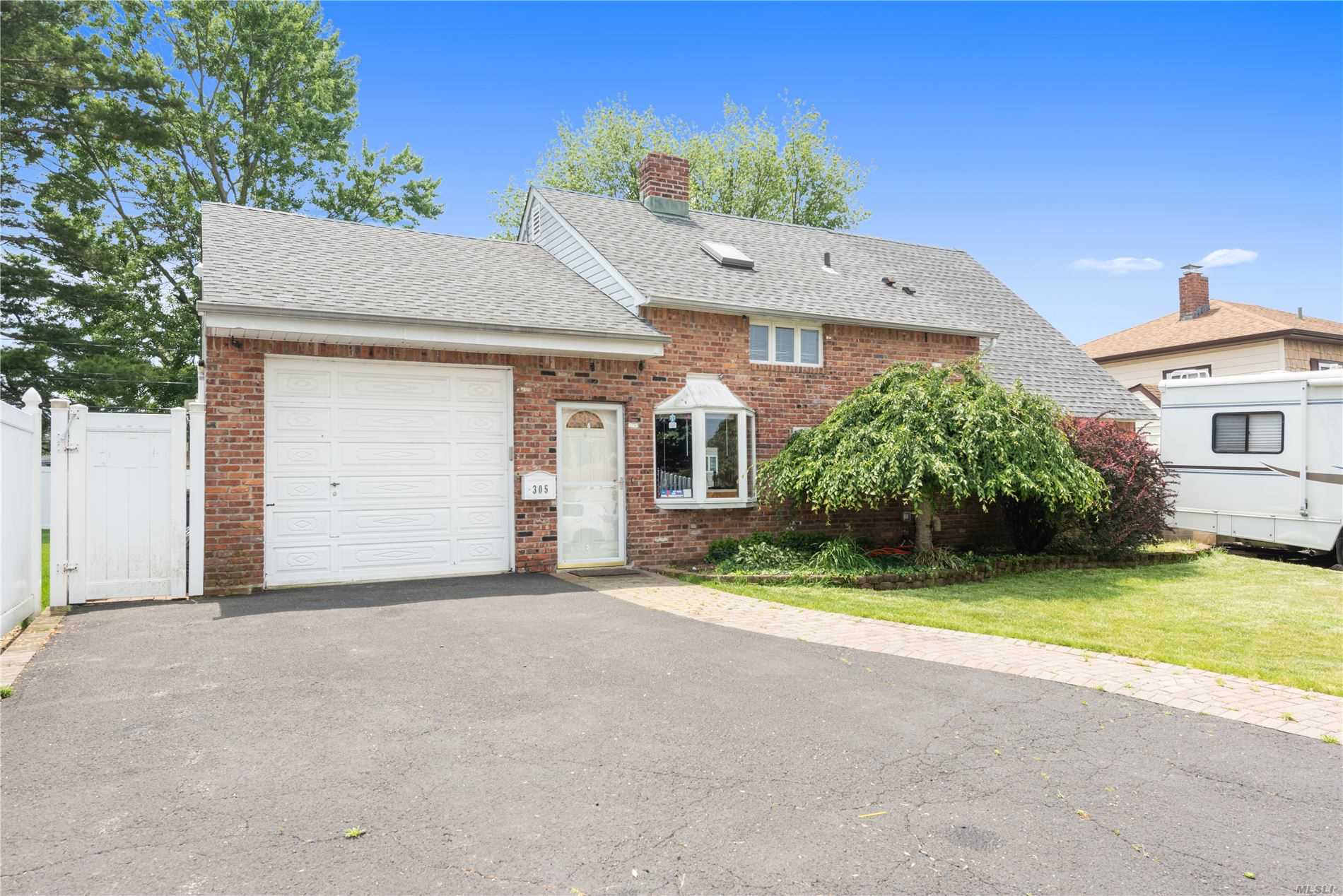 #1 photo, 305 S Elm Drive, Levittown , NY 11756