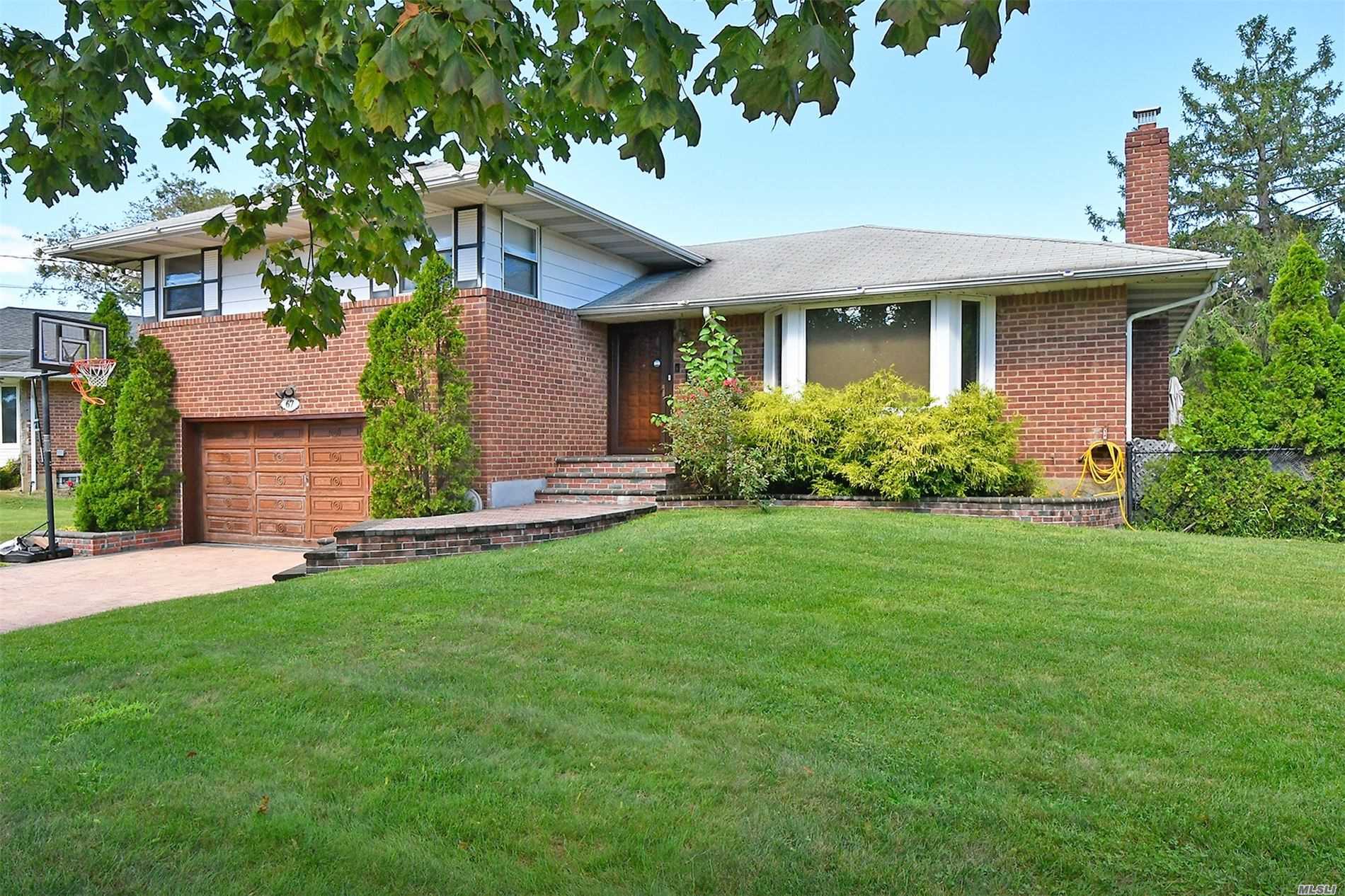 #1 photo, 67 Ridge Drive, Westbury , NY 11590