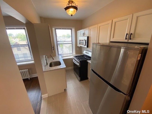 #1 photo, 62-98 Saunders Street, Rego Park , NY 11374