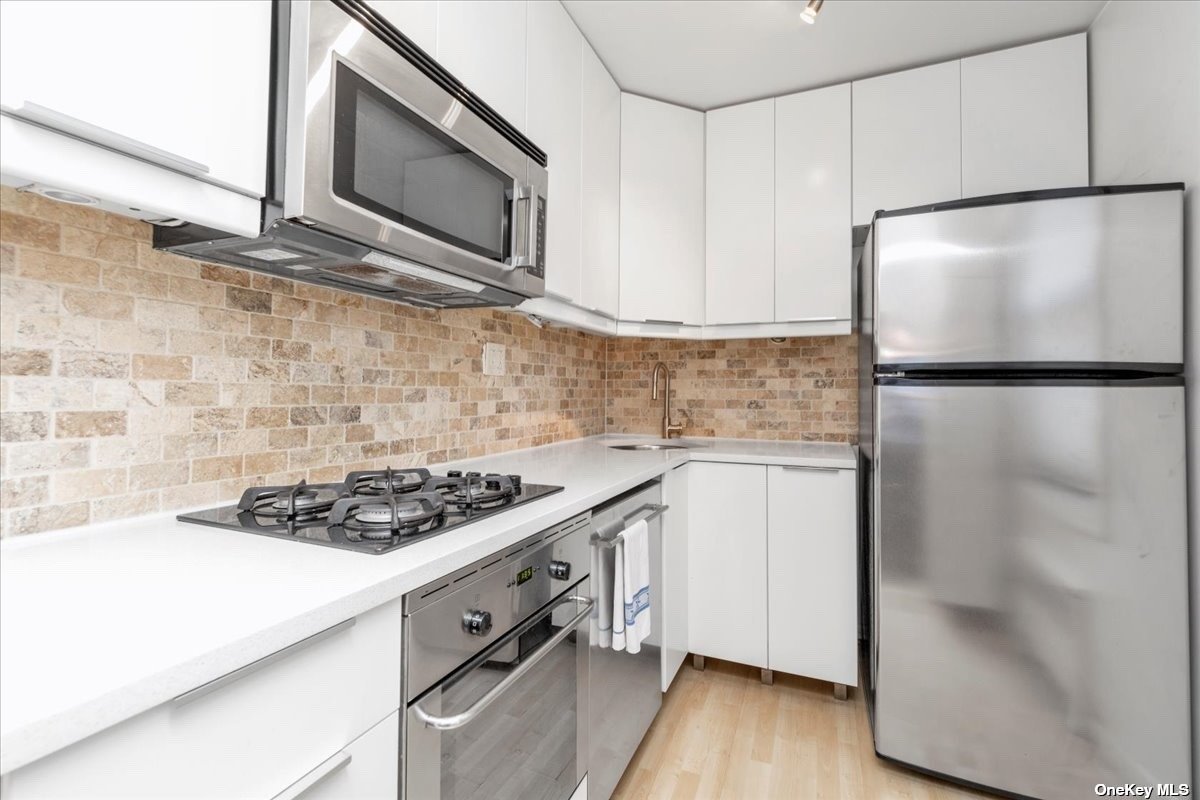 #1 photo, 71-35 Park Drive, Kew Garden Hills , NY 11367