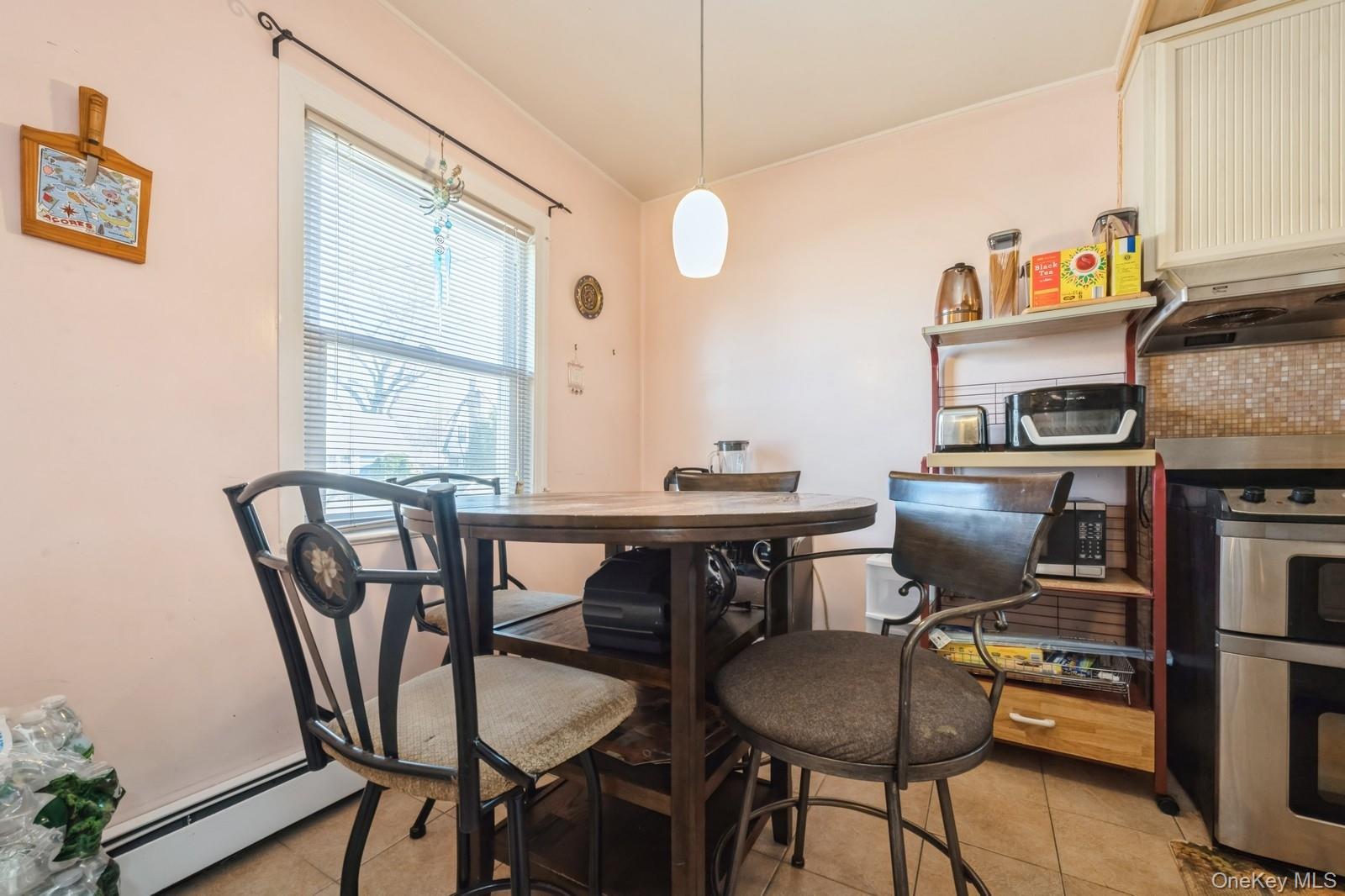 #4 photo, 31 Cedar Street, Roosevelt , NY 11575