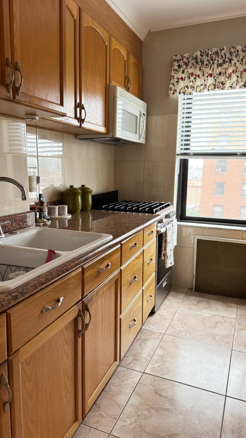 #7 photo, 99-05 63rd Drive, 皇后區 雷哥公園 Rego Park , NY 11374