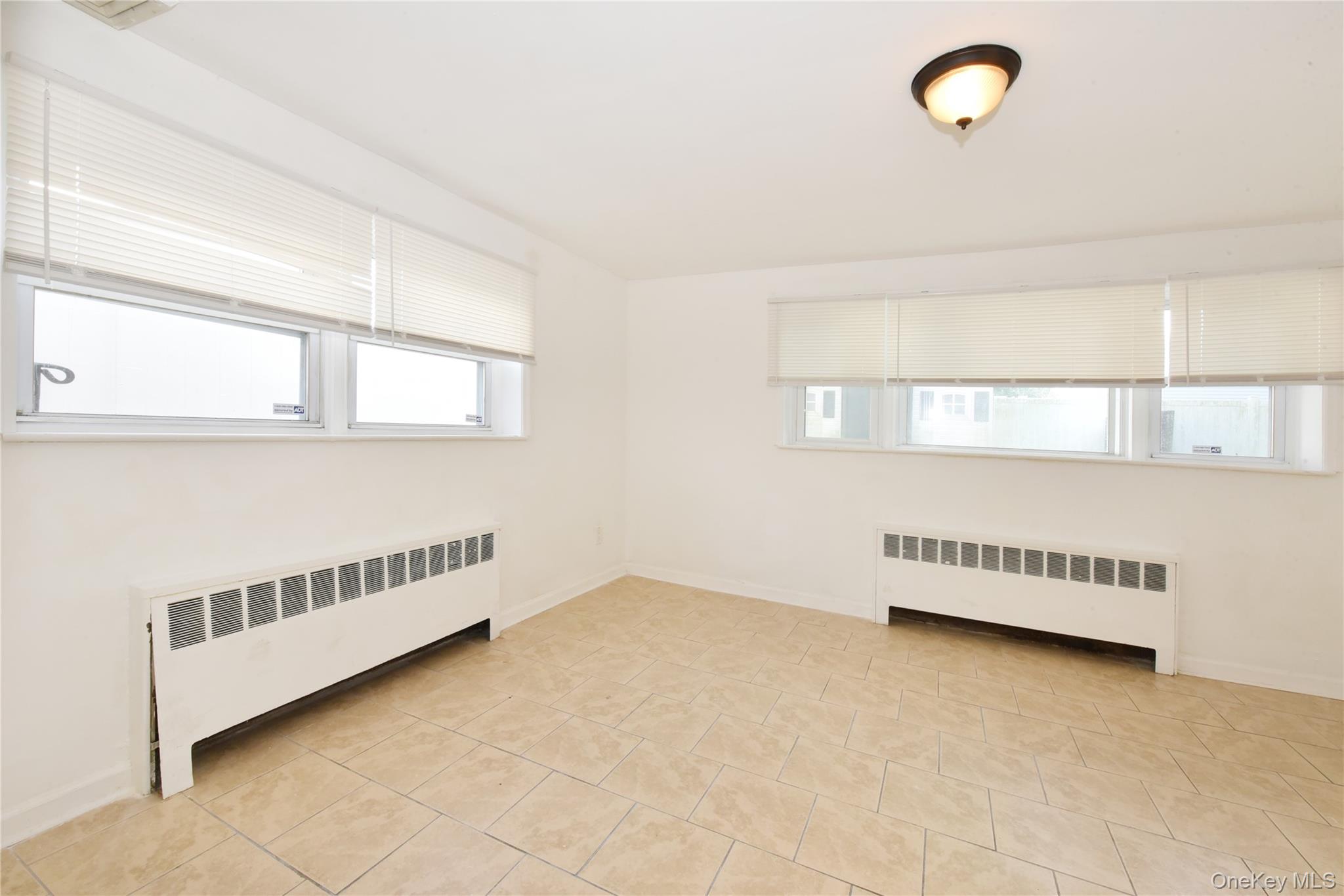 #14 photo, 114 Frederick Avenue, Roosevelt , NY 11575