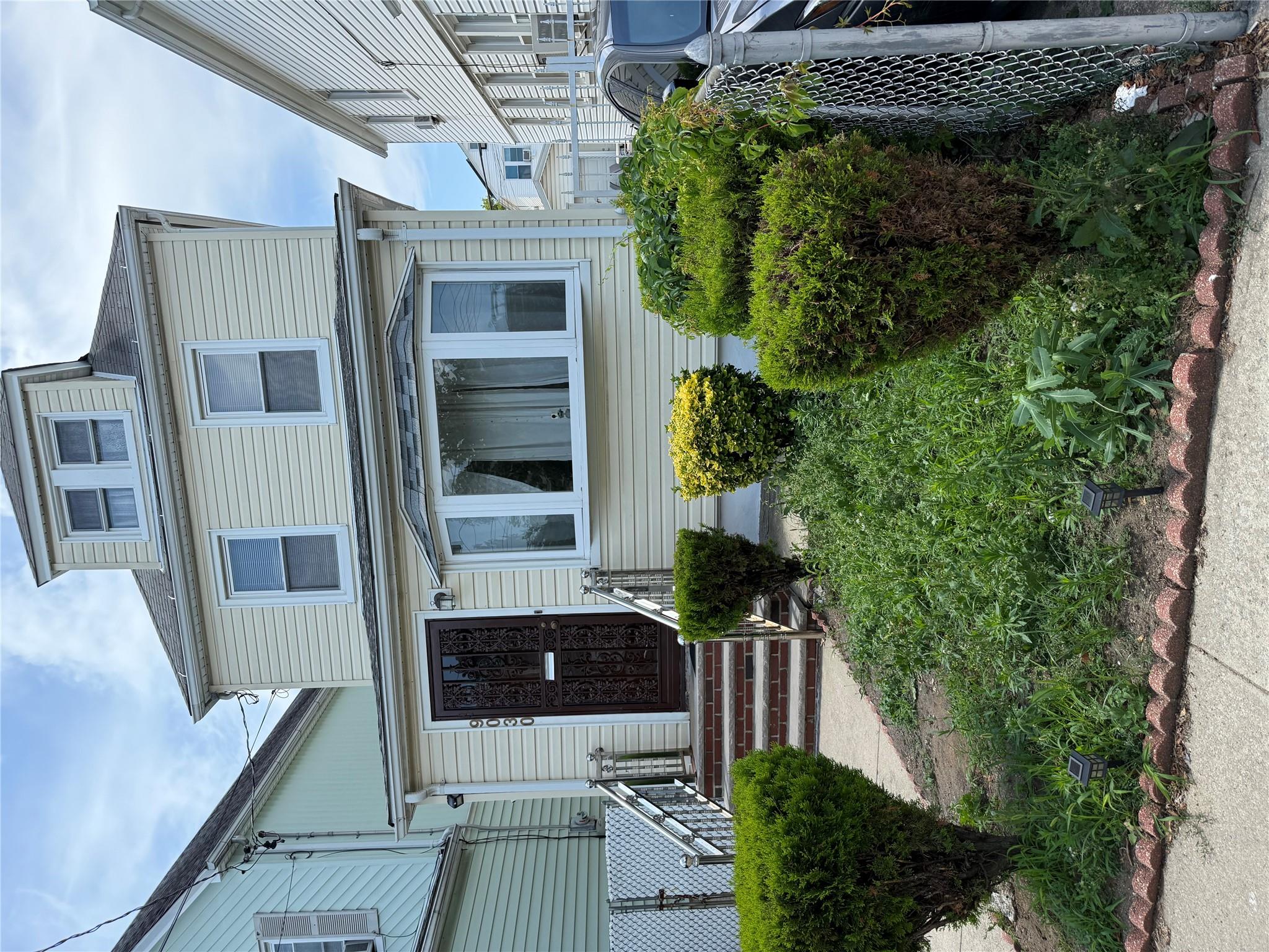 #1 photo, 9030 202nd Street, Hollis , NY 11423