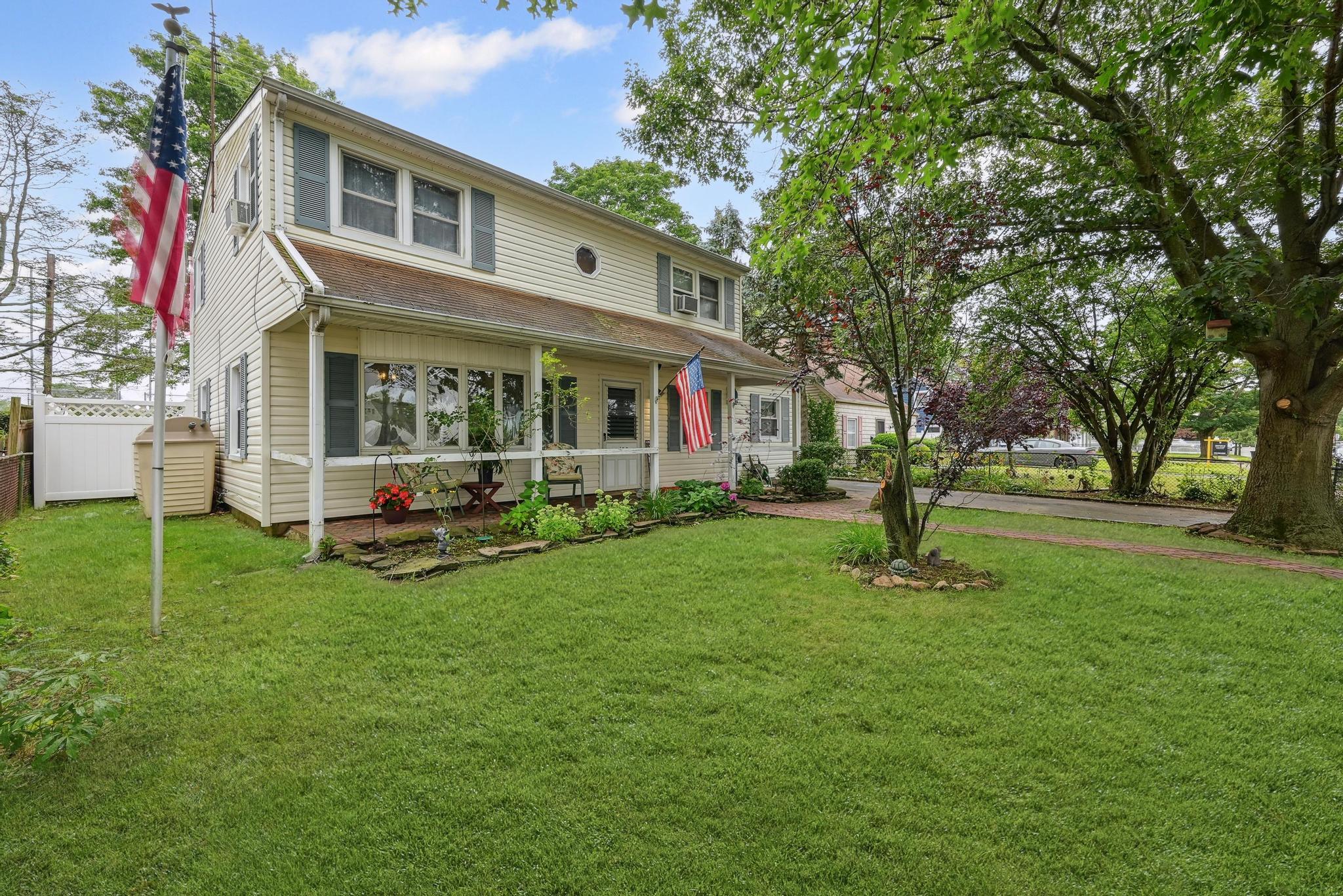 #1 photo, 129 Spring Lane, Levittown , NY 11756