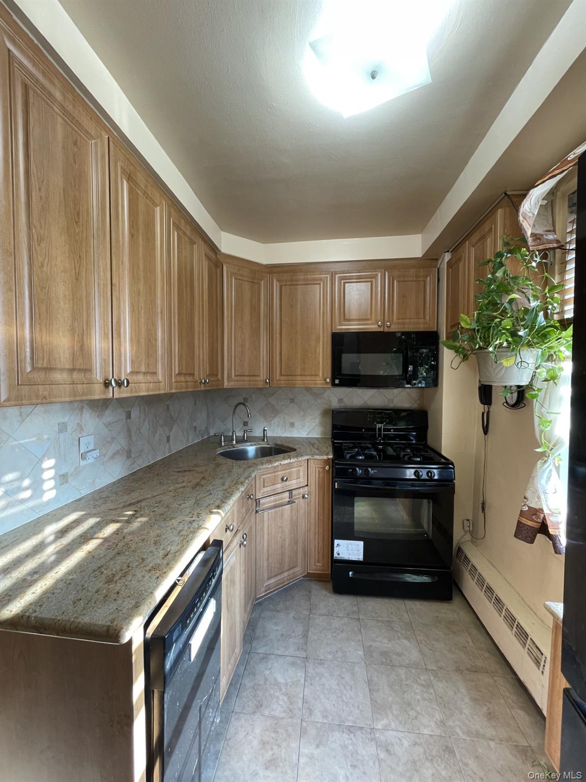 #9 photo, 9740 62nd Drive, Rego Park , NY 11374