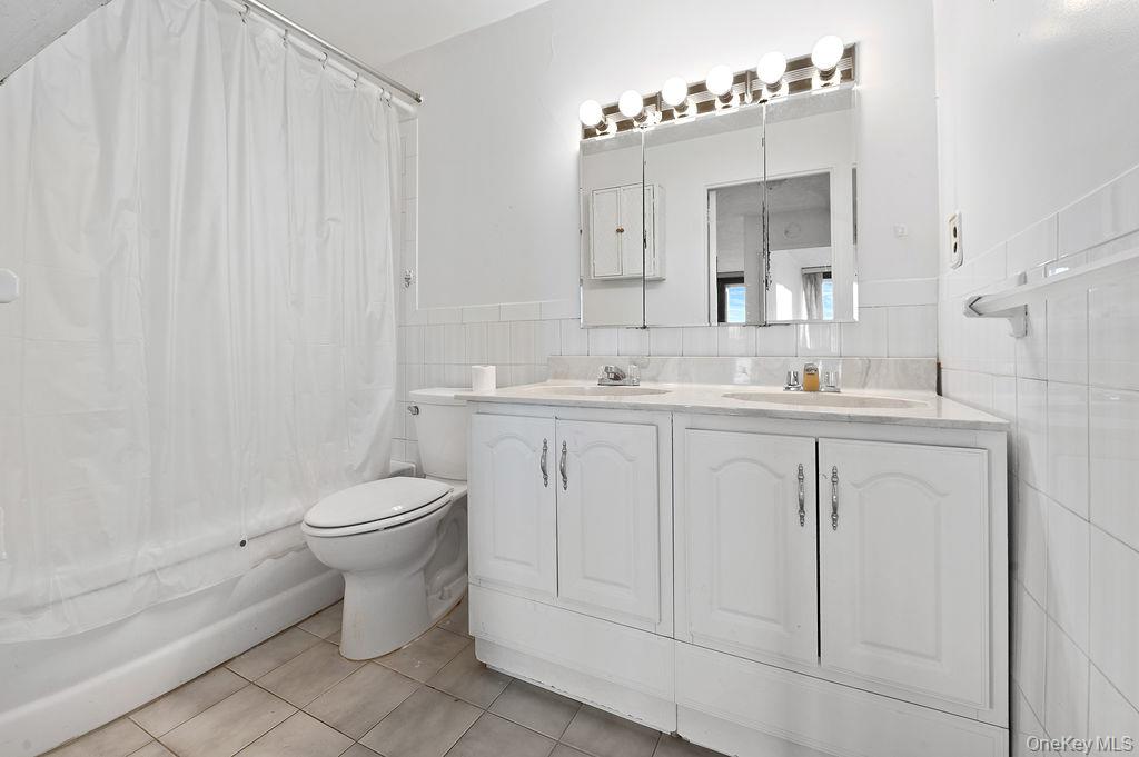 #8 photo, 162-40 9th Avenue, Beechhurst , NY 11357