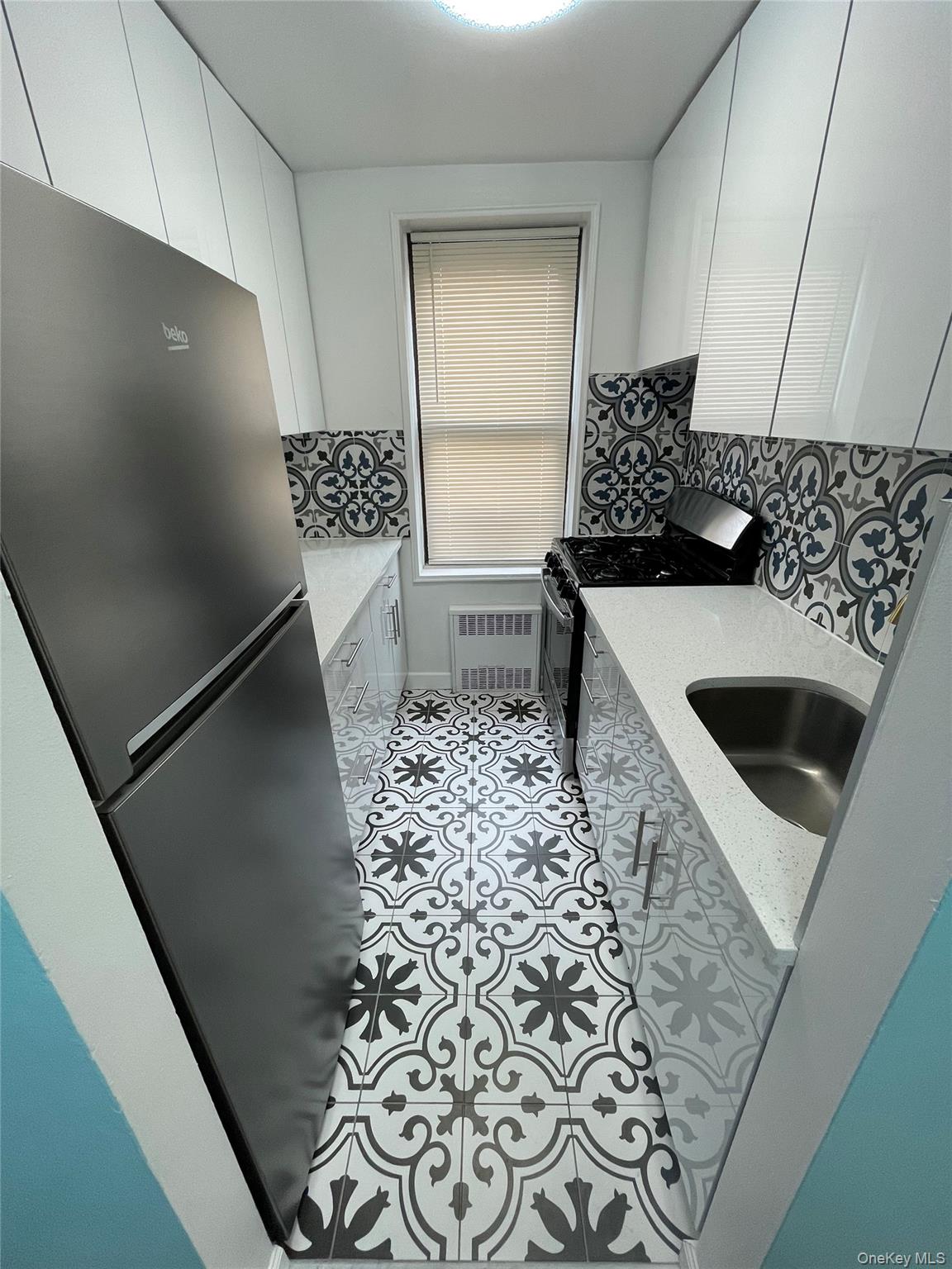 #1 photo, 83-85 116 Street, Kew Gardens , NY 11415