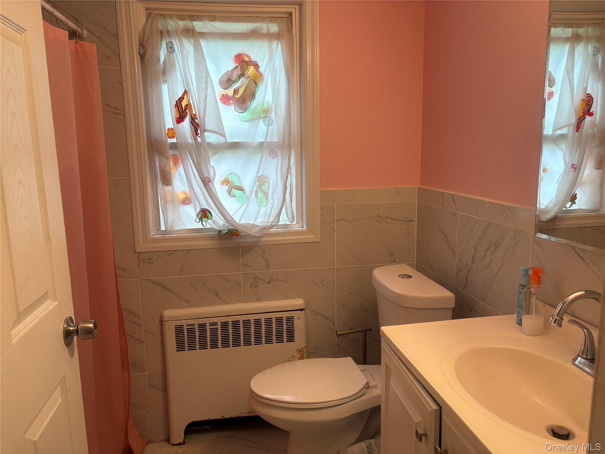 #12 photo, 35 W Raymond Avenue, Roosevelt , NY 11575