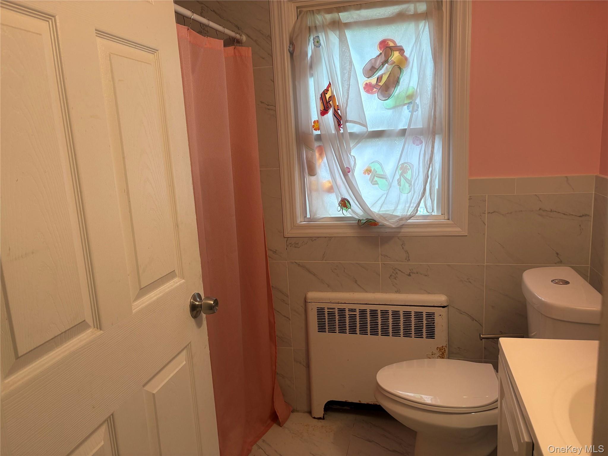 #13 photo, 35 W Raymond Avenue, Roosevelt , NY 11575