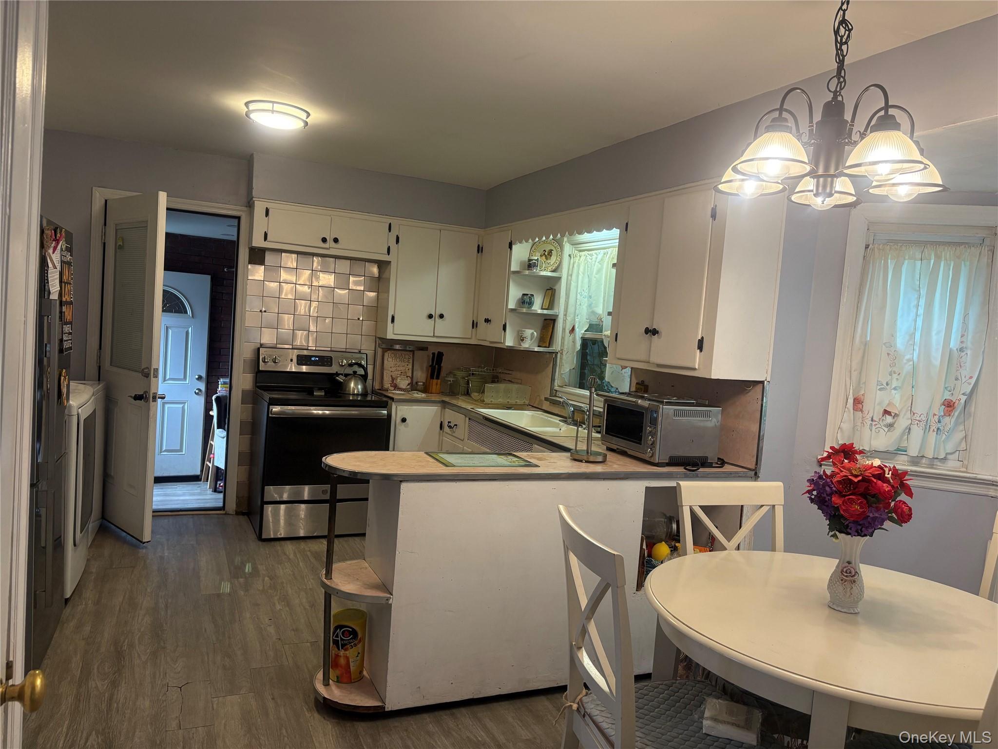 #3 photo, 35 W Raymond Avenue, Roosevelt , NY 11575