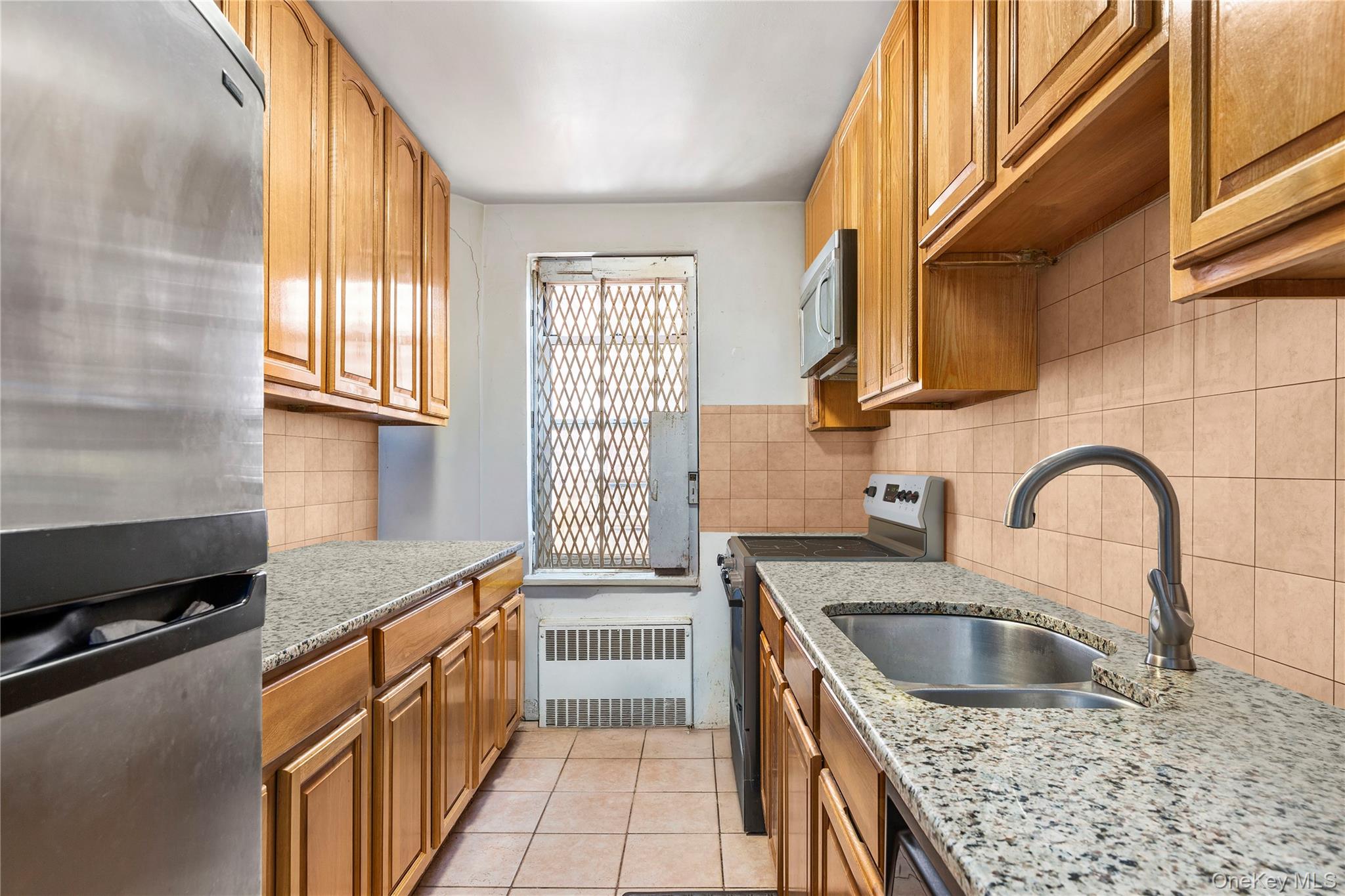 #6 photo, 99-31 64th Avenue, Rego Park , NY 11374