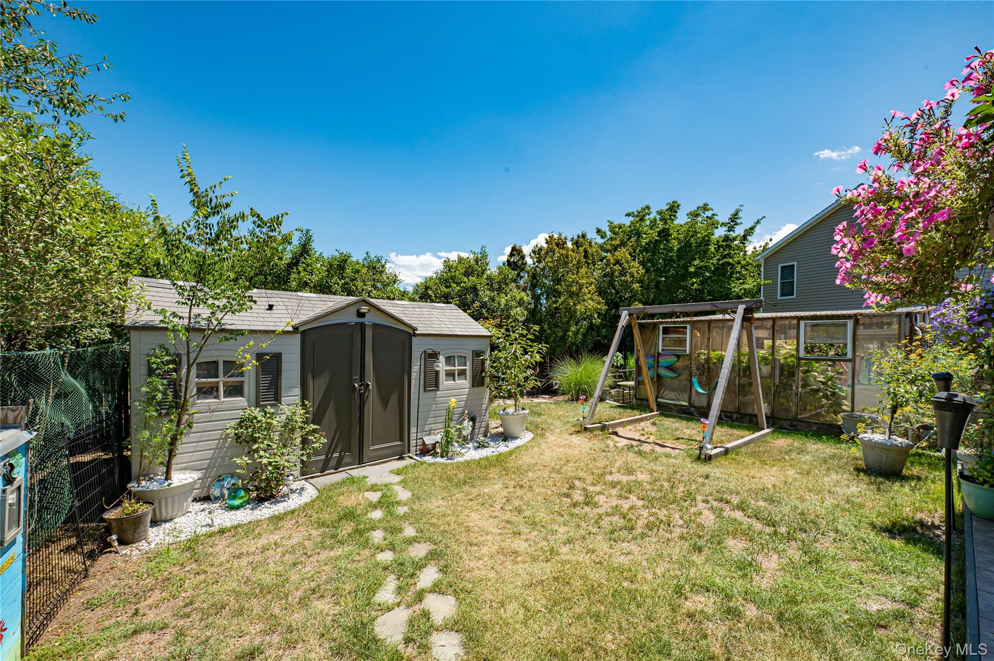 #18 photo, 8 Woodbrook Drive, サフォーク郡 Ridge , NY 11961