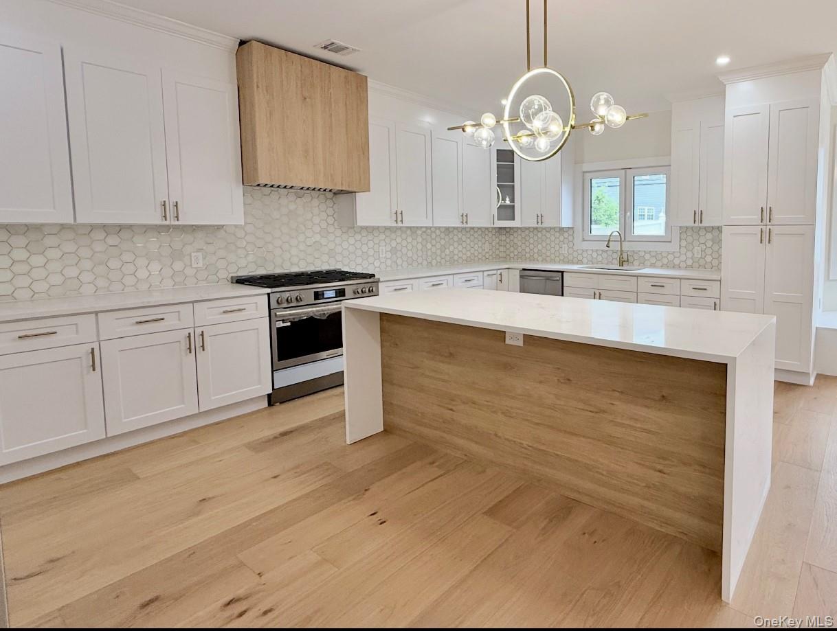 #12 photo, 60 Periwinkle Road, ナッソー郡 Levittown , NY 11756