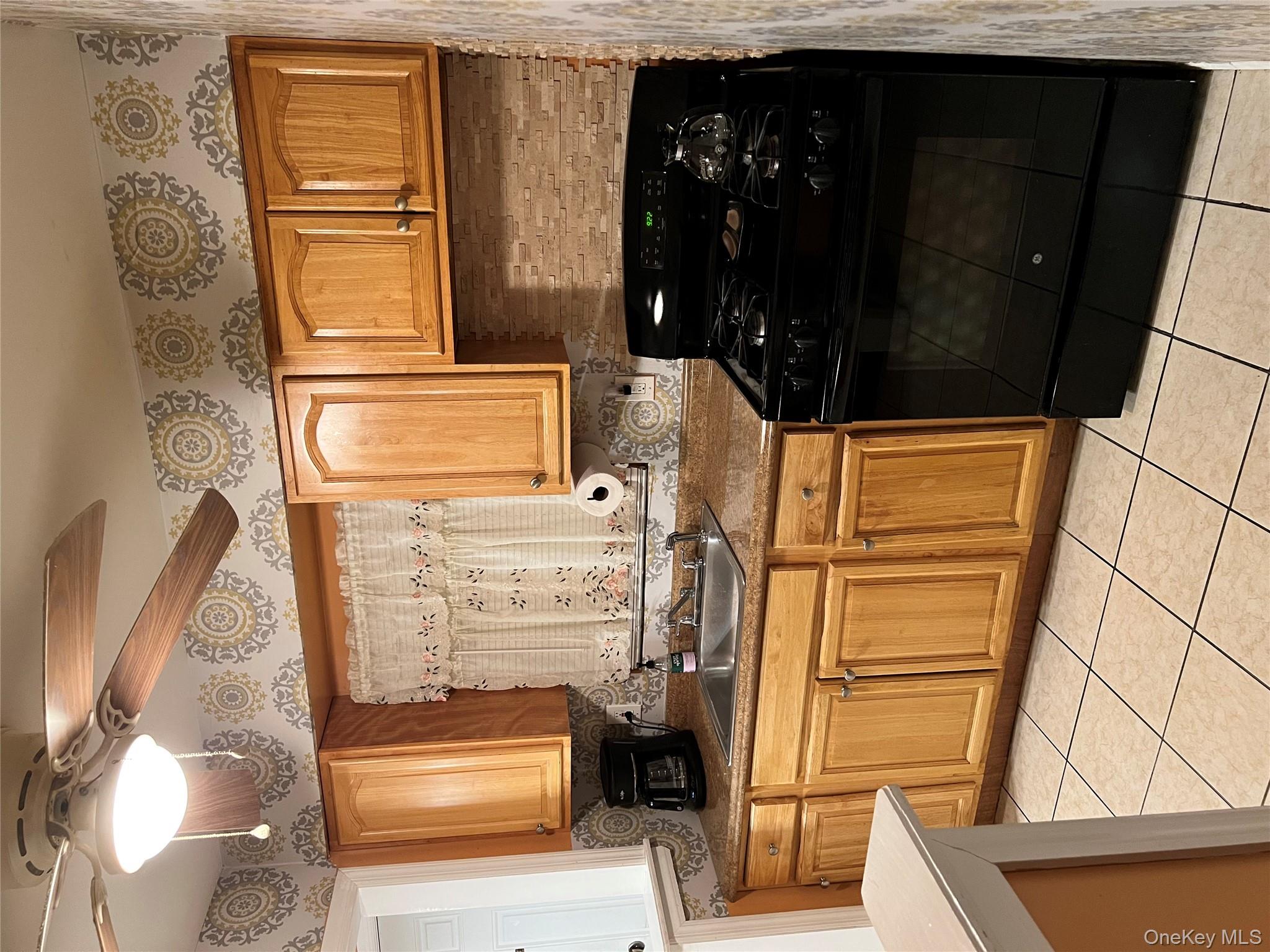 #3 photo, 121 E Pennywood Avenue, Roosevelt , NY 11575