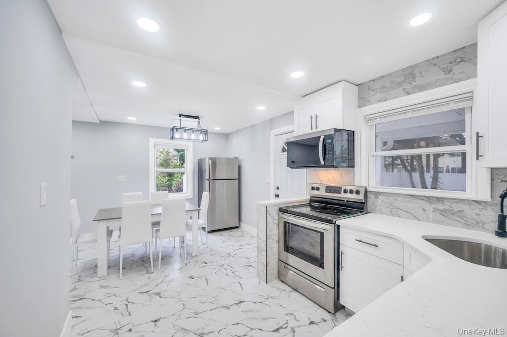 #6 photo, 674 Winthrop Drive, Uniondale , NY 11553