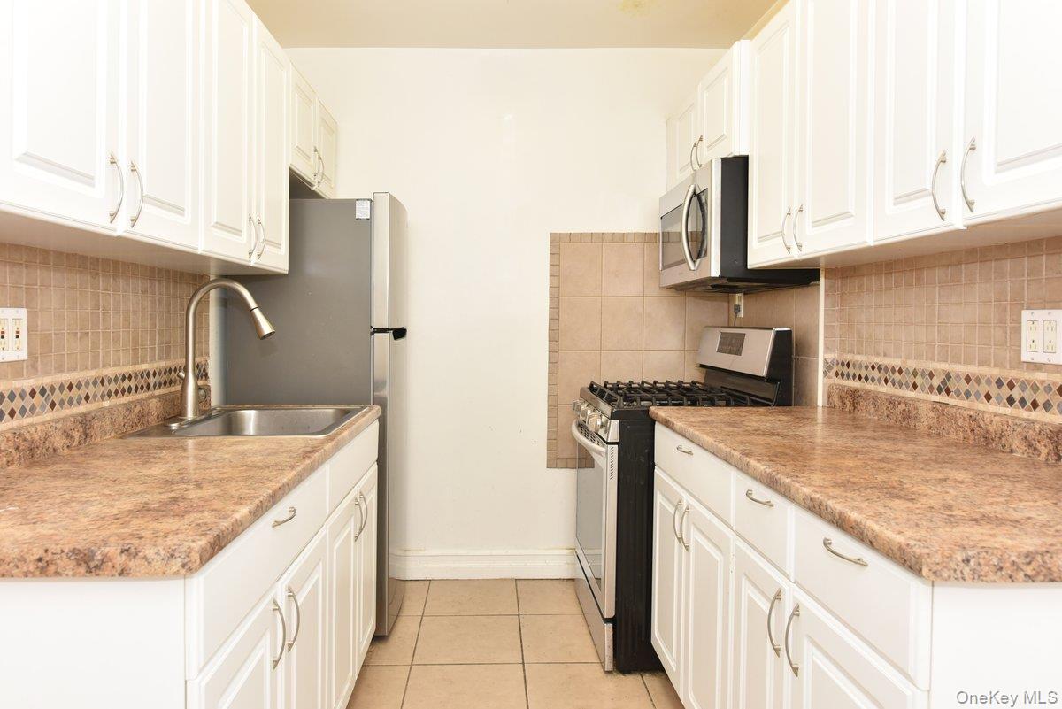 #10 photo, 84-01 Main Street, Briarwood , NY 11435