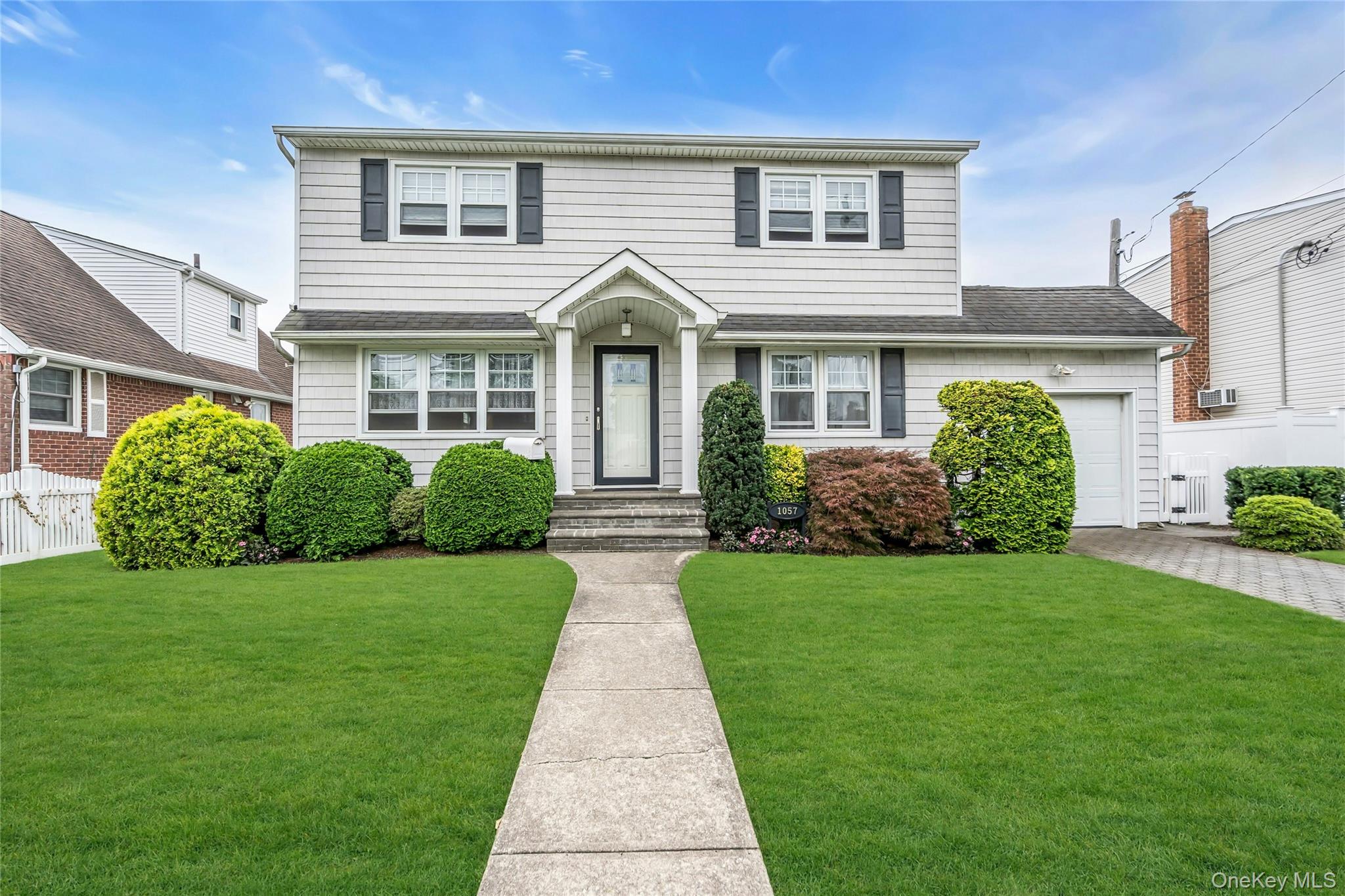 #1 photo, 1057 Grand Boulevard, Westbury , NY 11590