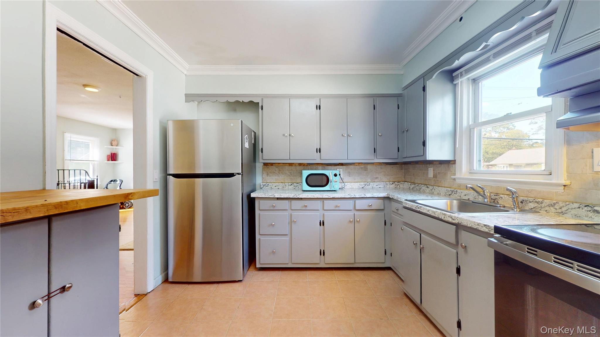 #8 photo, 40 Wagner Avenue, Roosevelt , NY 11575