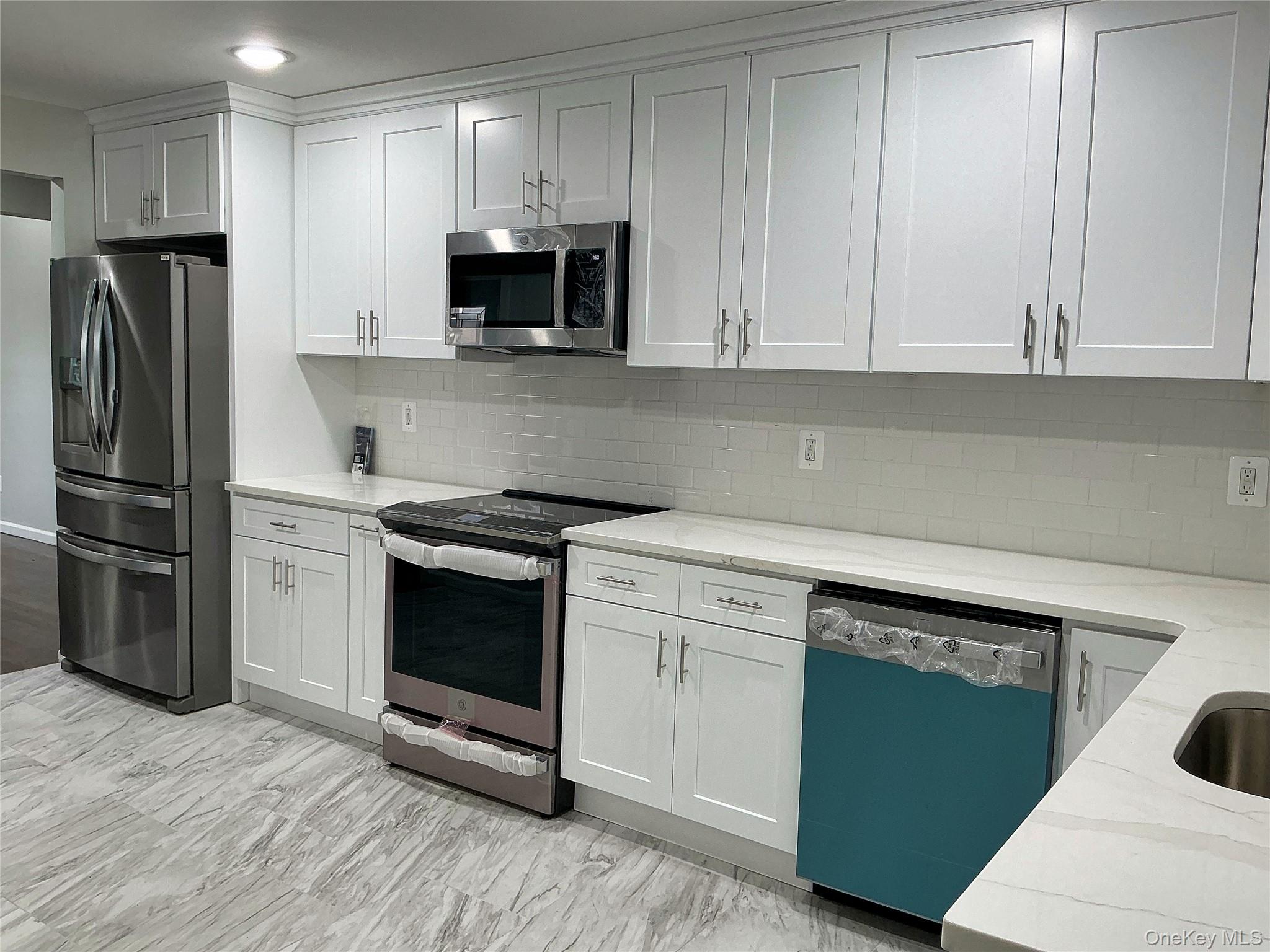 #13 photo, 9 Holt Street, Amityville , NY 11701