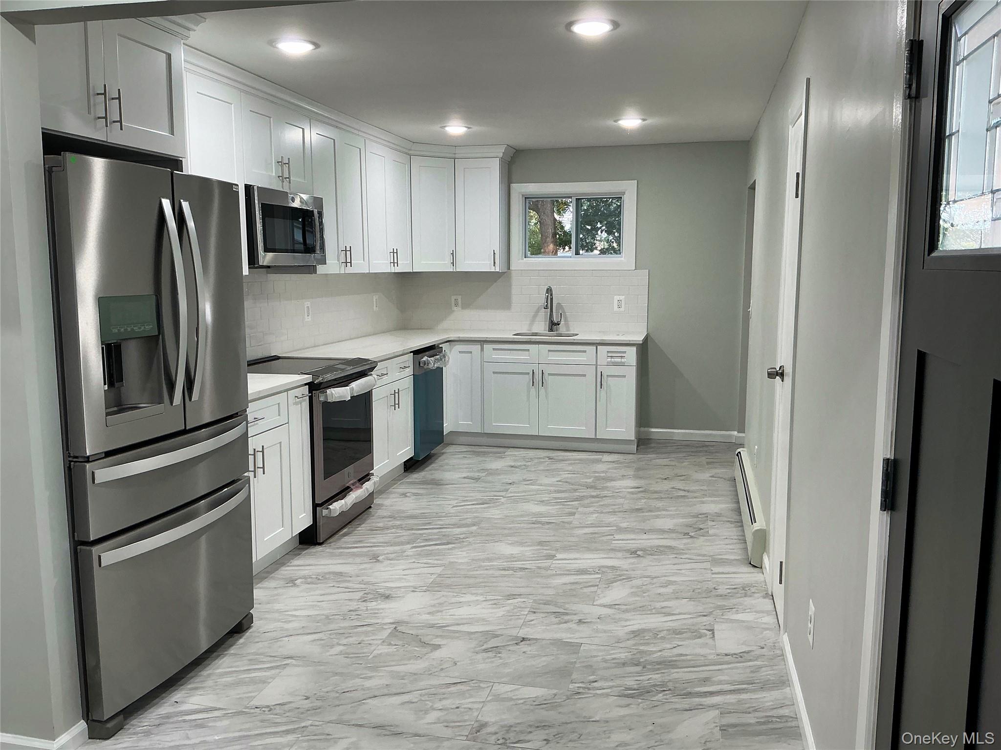 #4 photo, 9 Holt Street, Amityville , NY 11701