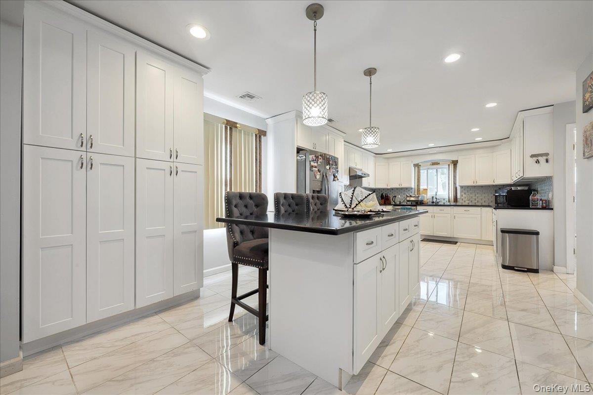 #11 photo, 45 Universe Drive, Levittown , NY 11756