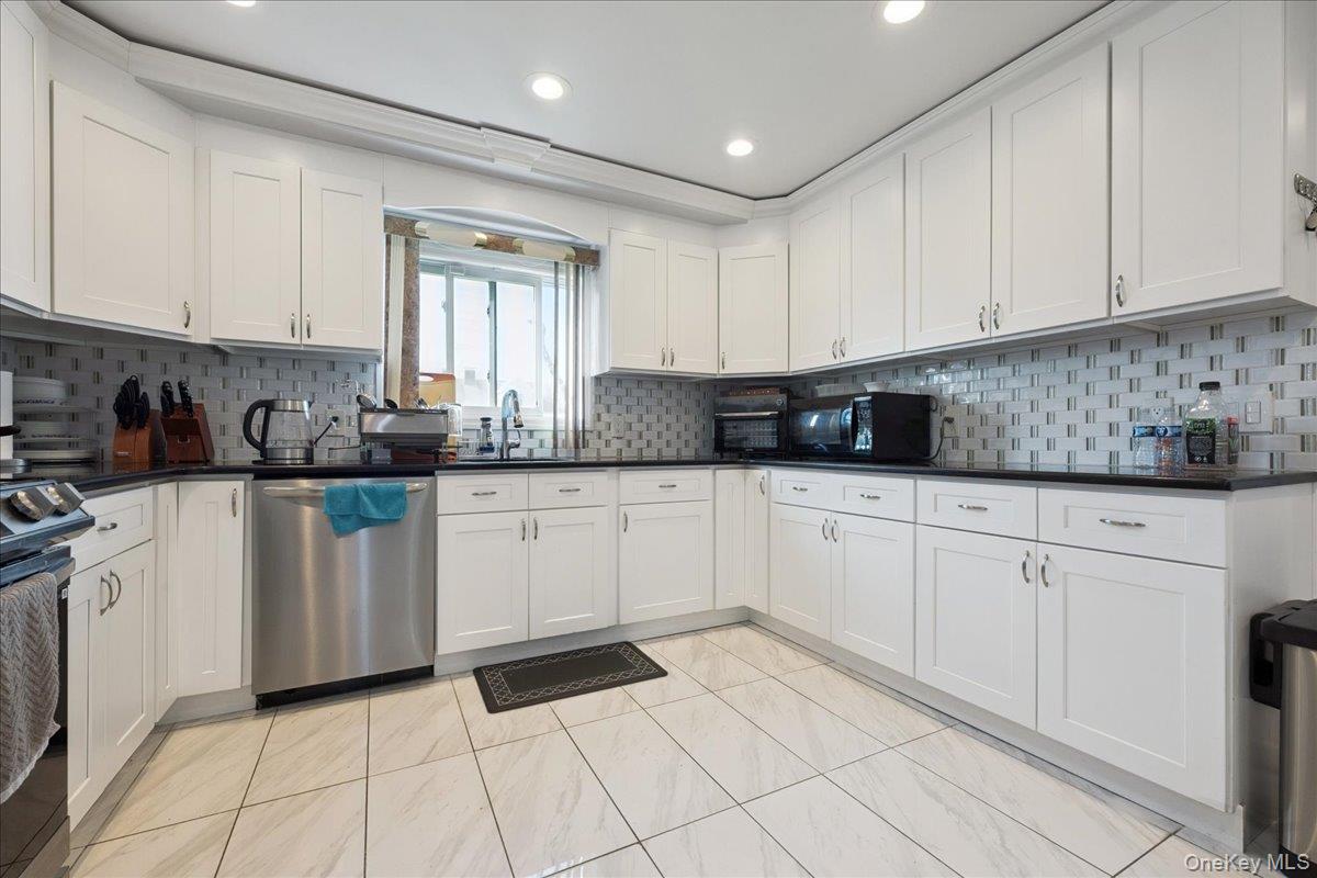 #9 photo, 45 Universe Drive, Levittown , NY 11756