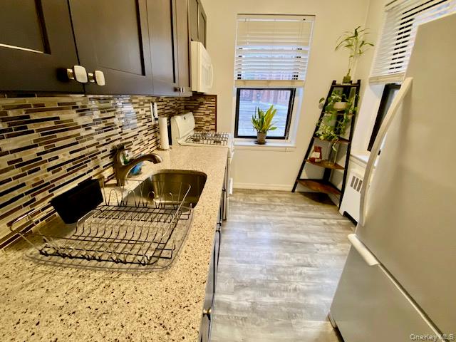 #5 photo, 88-10 32 Av, East Elmhurst , NY 11369