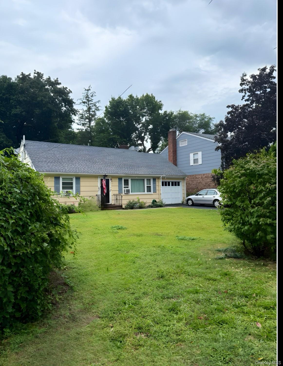 #1 photo, 18 Downing Avenue, नासाउ काउंटी Sea Cliff , NY 11579