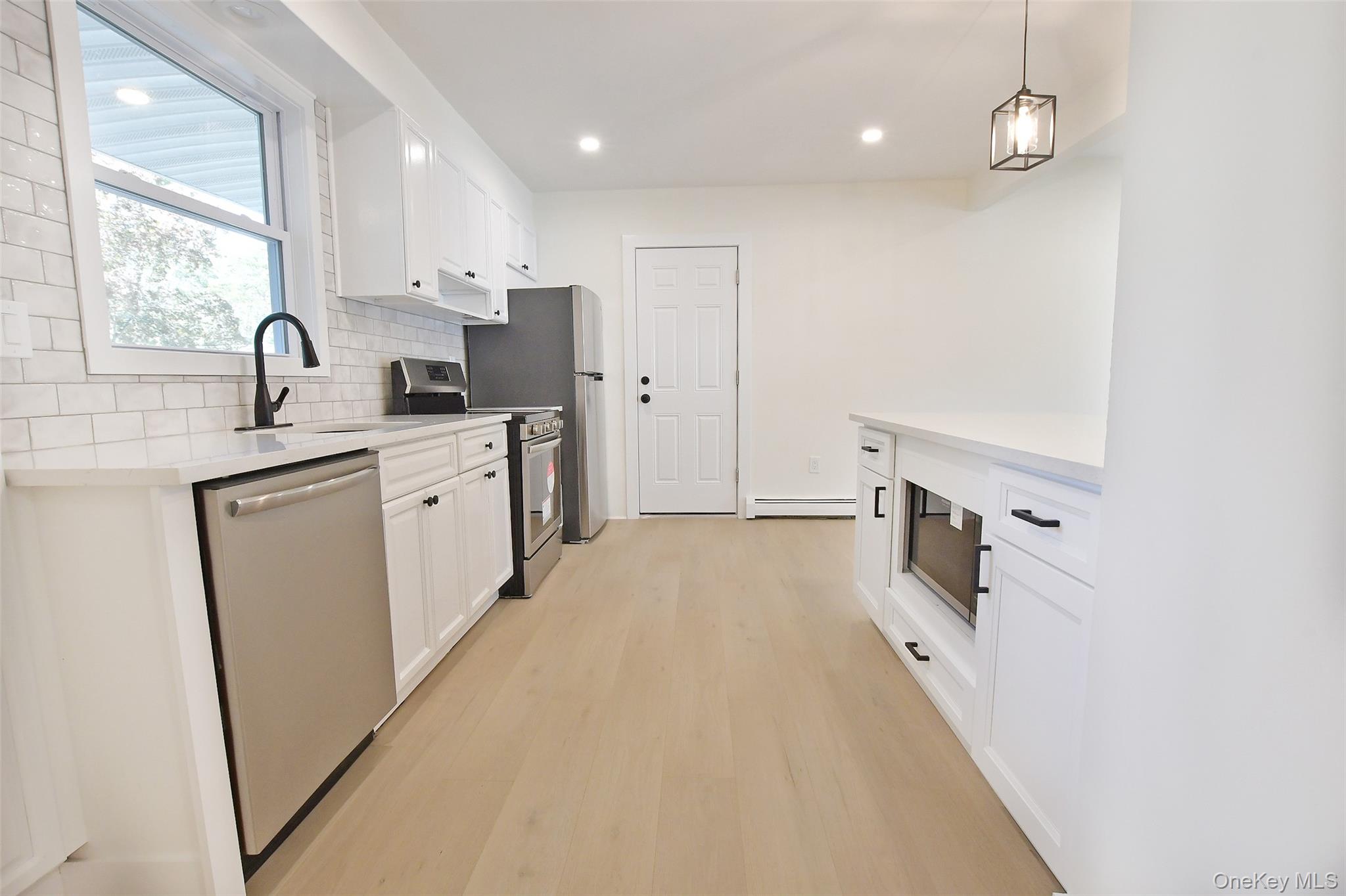 #5 photo, 15 Spurwoods Lane, Farmingville , NY 11738