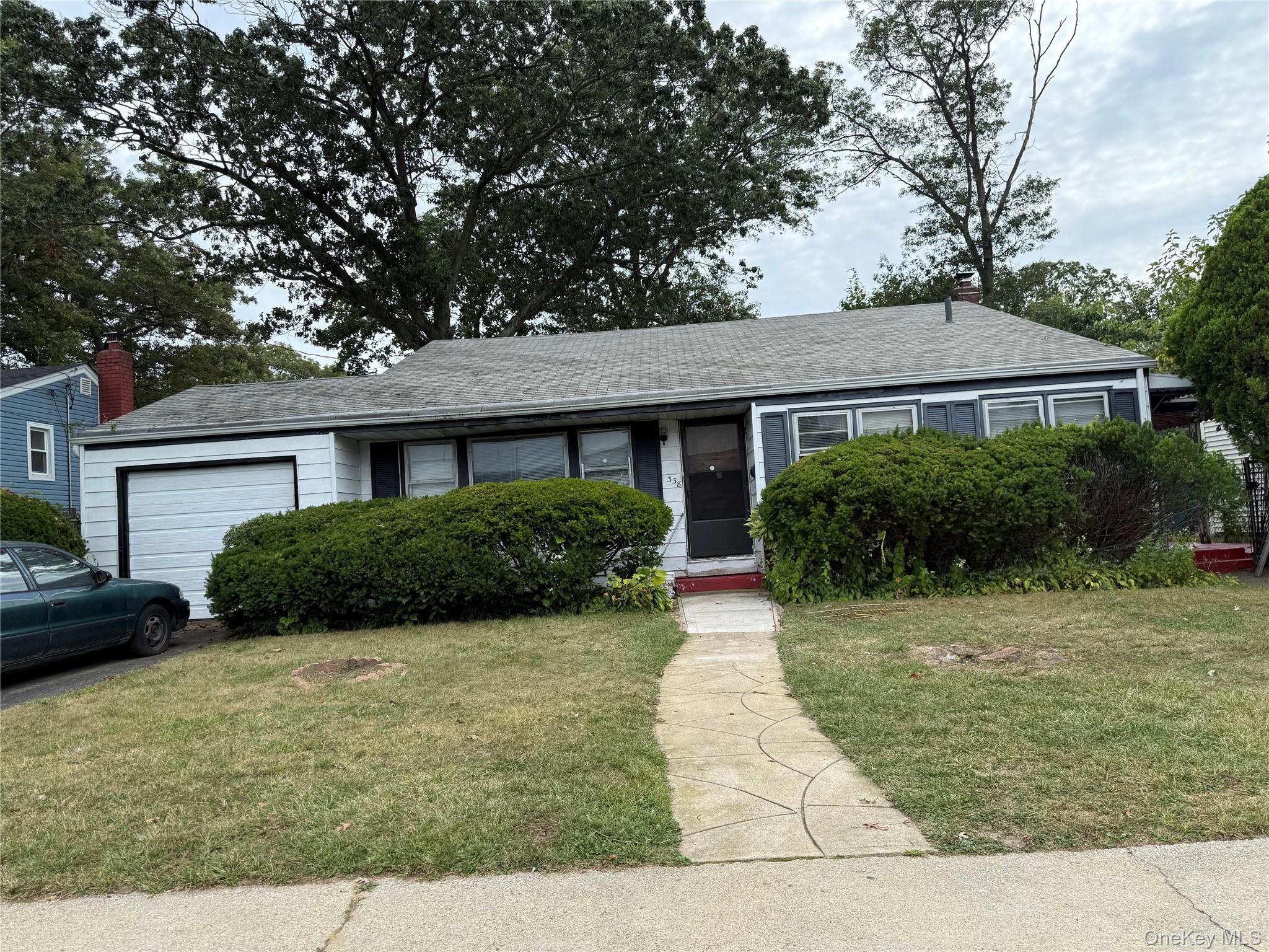 #1 photo, 338 E Clinton Avenue, Roosevelt , NY 11575