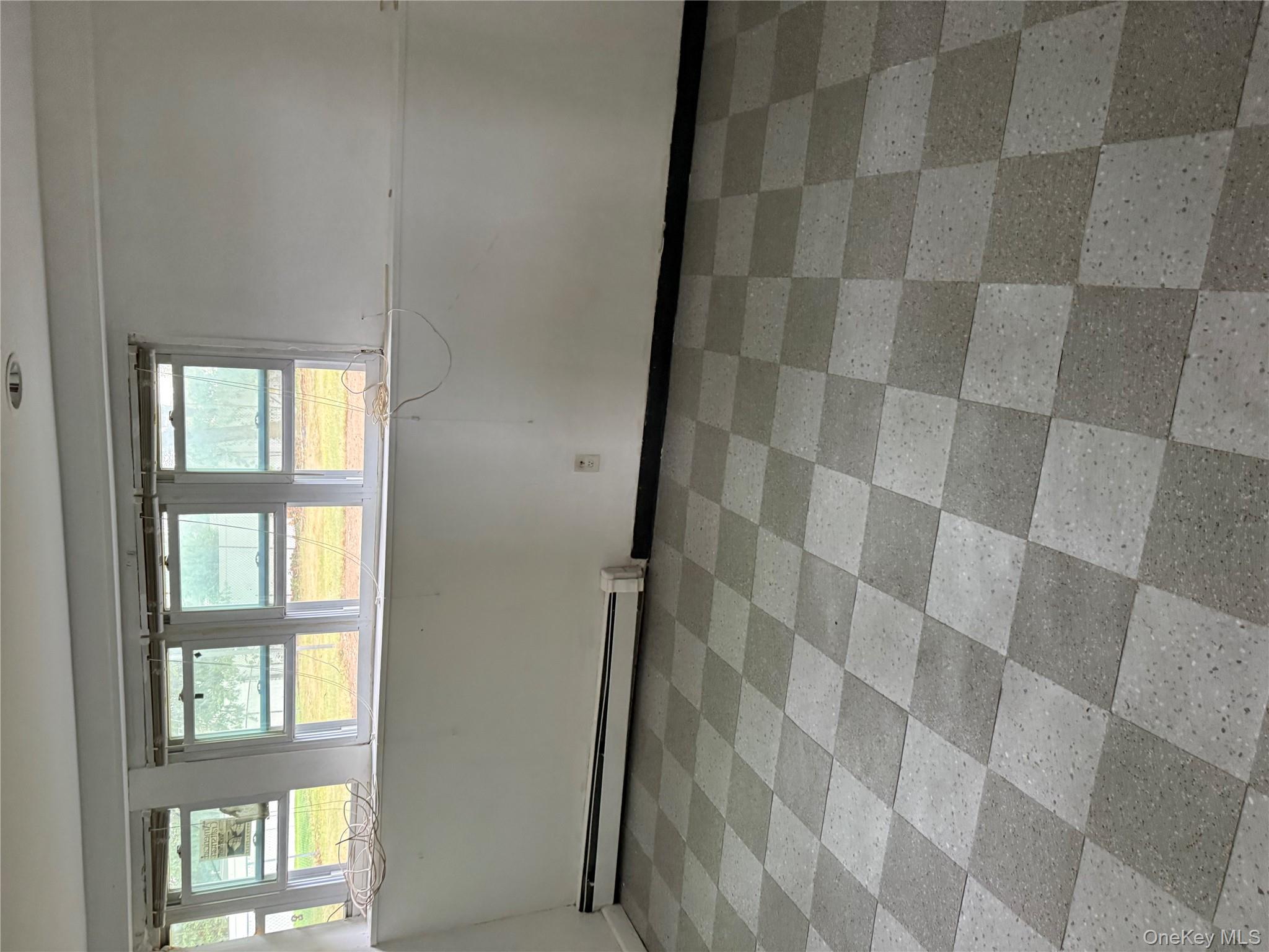 #5 photo, 338 E Clinton Avenue, Roosevelt , NY 11575