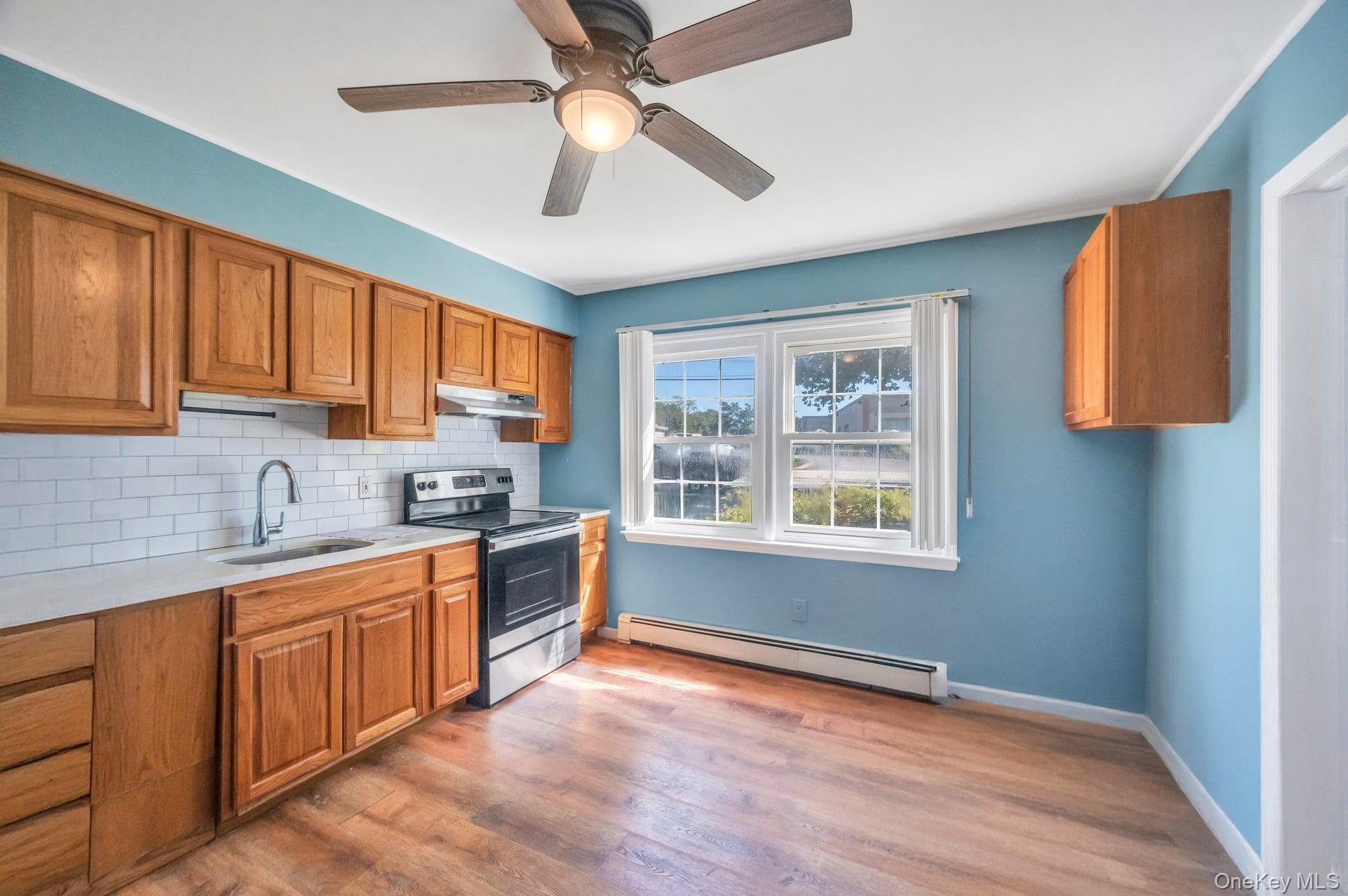 #13 photo, 81 Division Avenue, ナッソー郡 Levittown , NY 11756