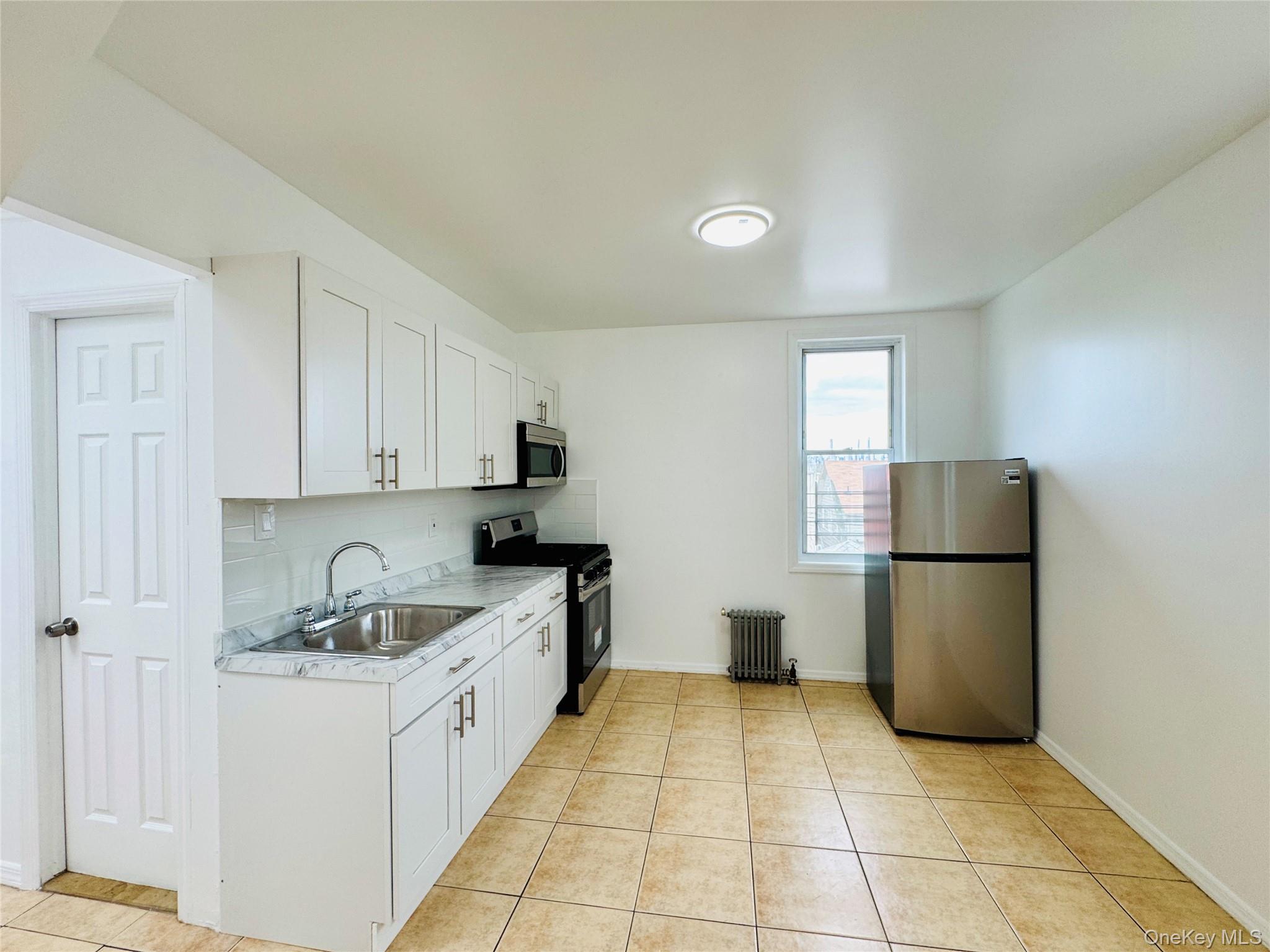 #13 photo, 3116 84th Street, Jackson Heights , NY 11370