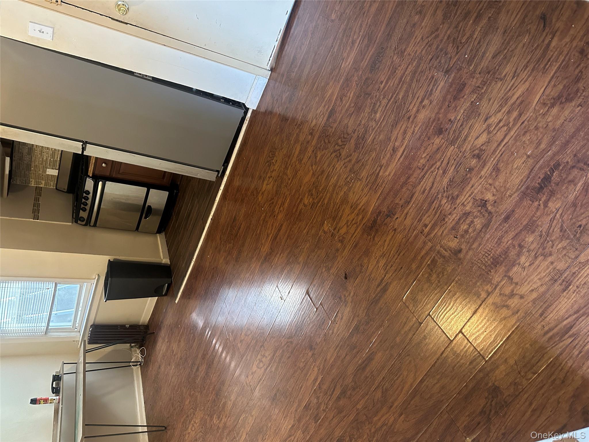 #3 photo, 19713 Jamaica Avenue, Hollis , NY 11423