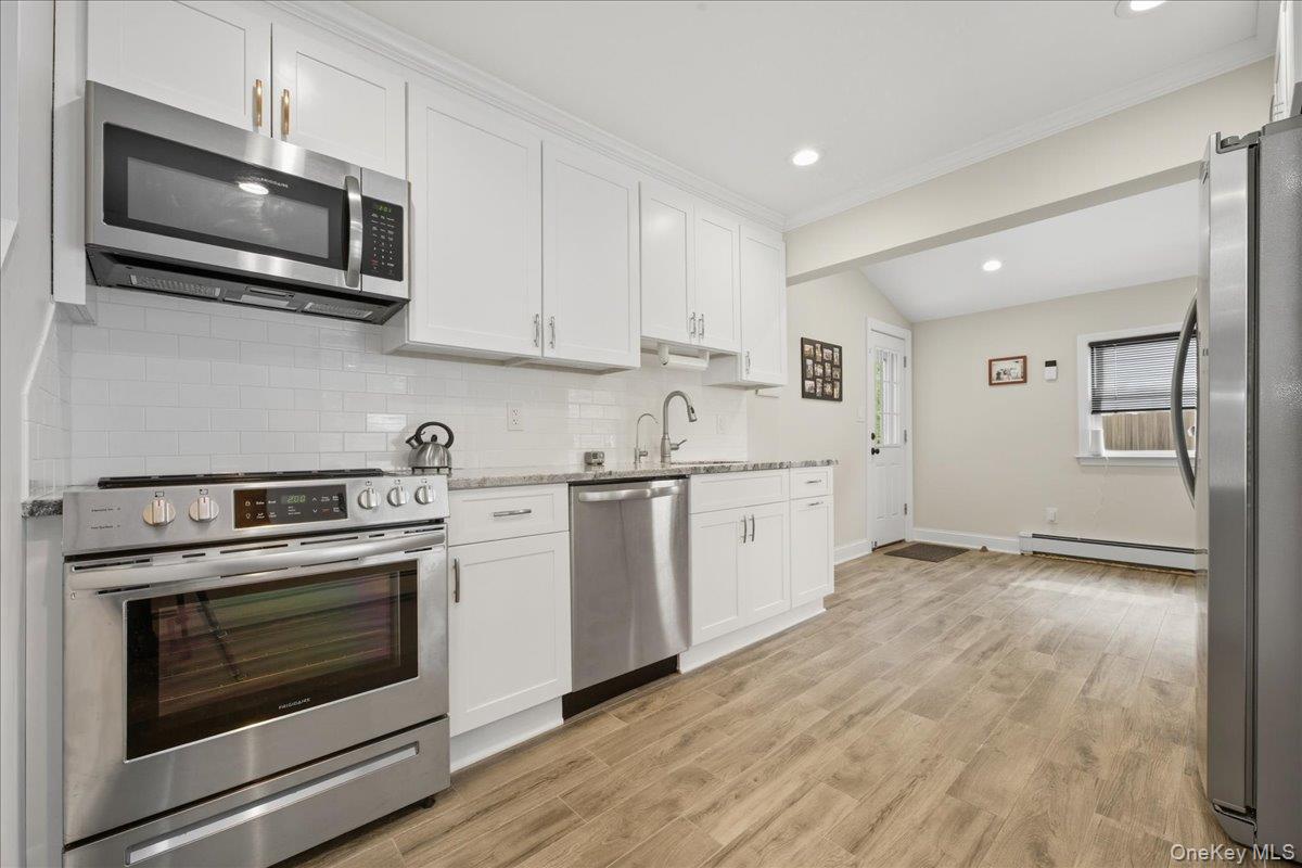 #5 photo, 59 Cotton Lane, ナッソー郡 Levittown , NY 11756