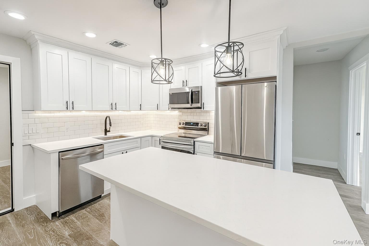 #12 photo, 437 Sunrise Highway, West Babylon , NY 11704