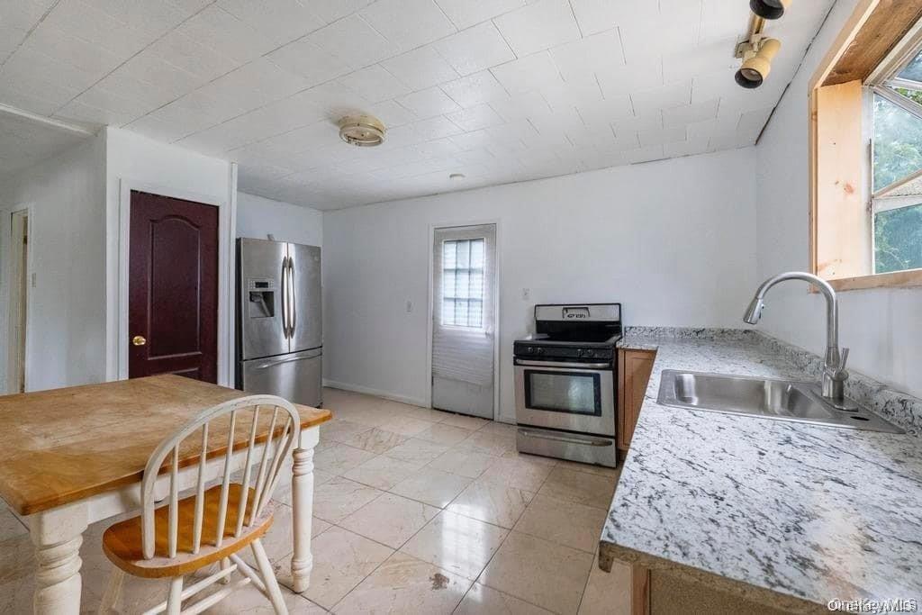 #4 photo, 84 State Avenue, Wyandanch , NY 11798