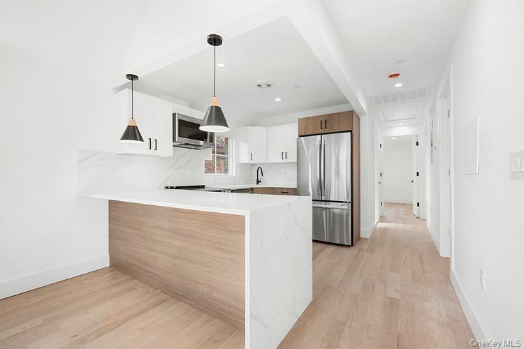 #19 photo, 38-40 215th Street, Bayside , NY 11361