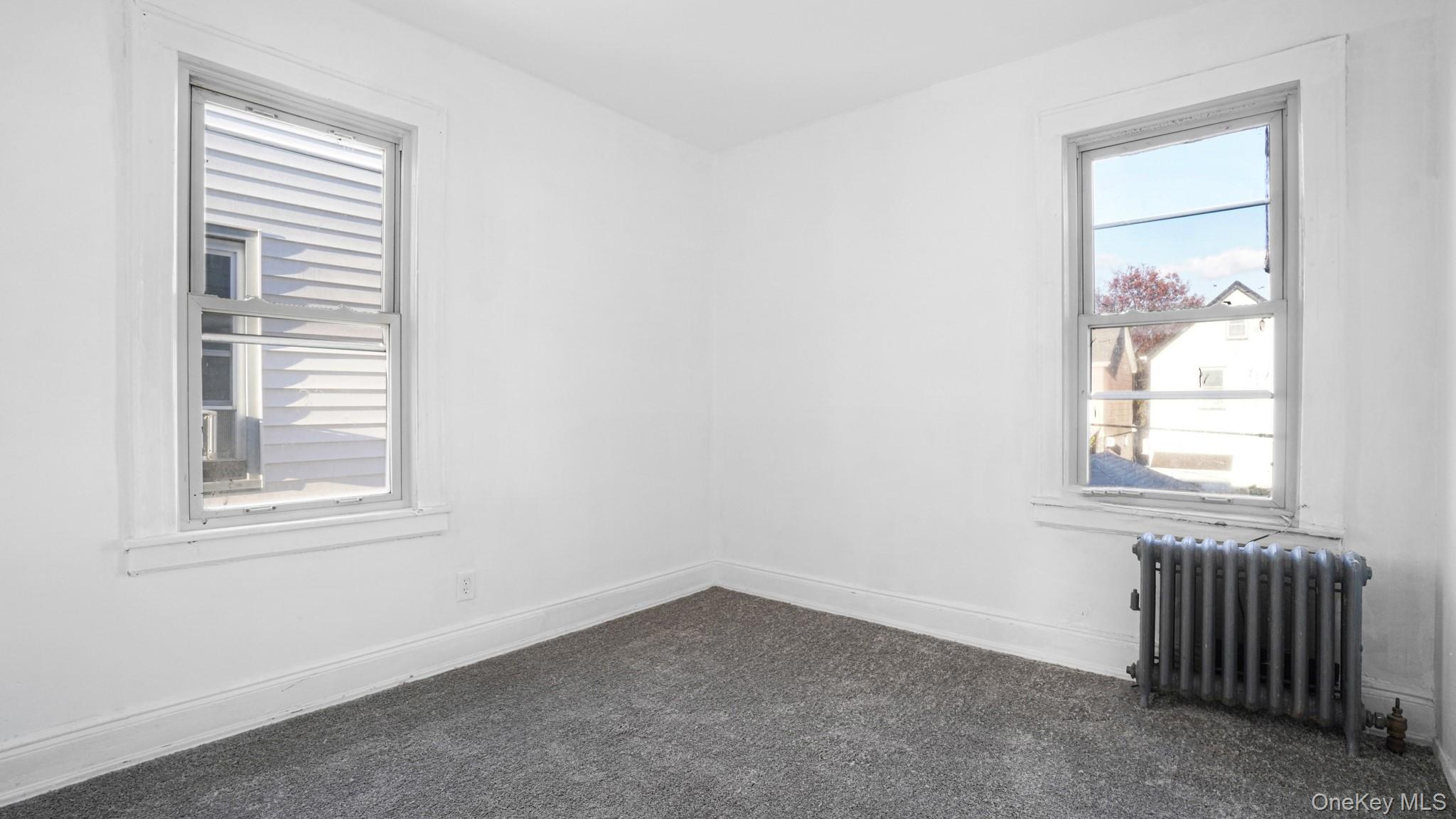 #15 photo, 93-45 202nd Street, Hollis , NY 11423