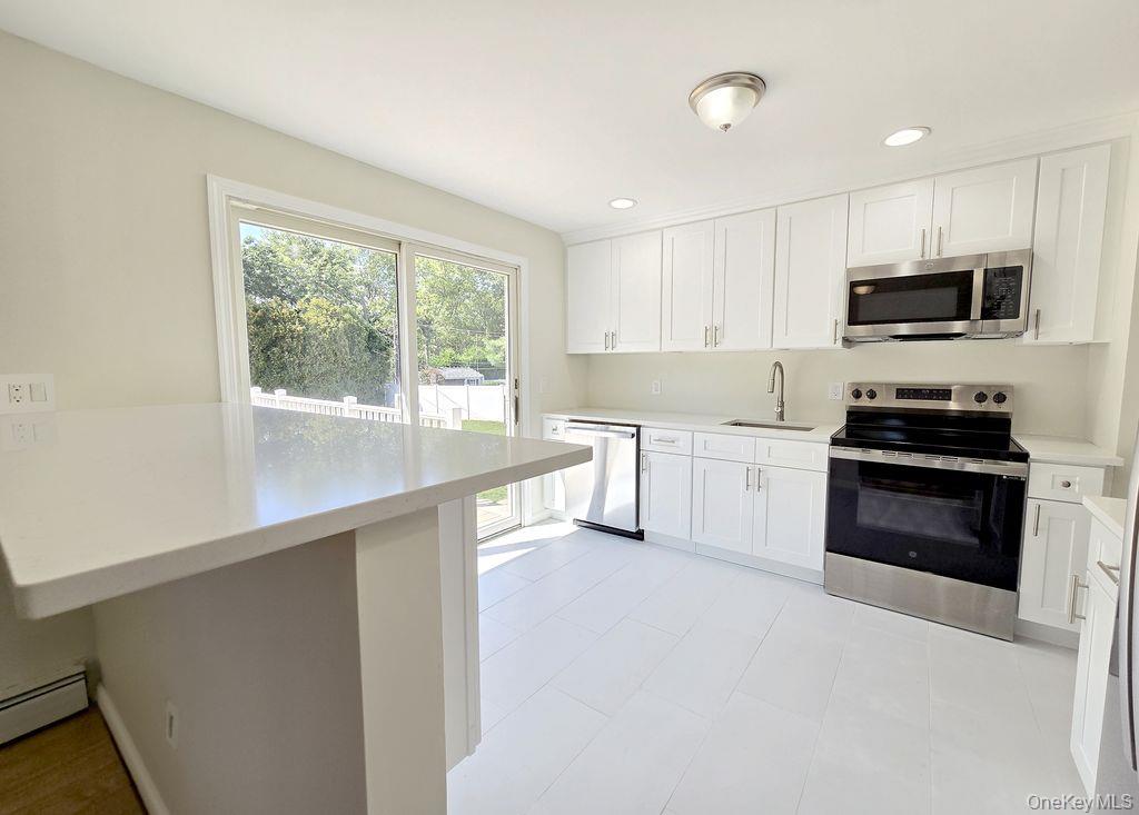 #4 photo, 76 Skylark Drive, サフォーク郡 Holtsville , NY 11742