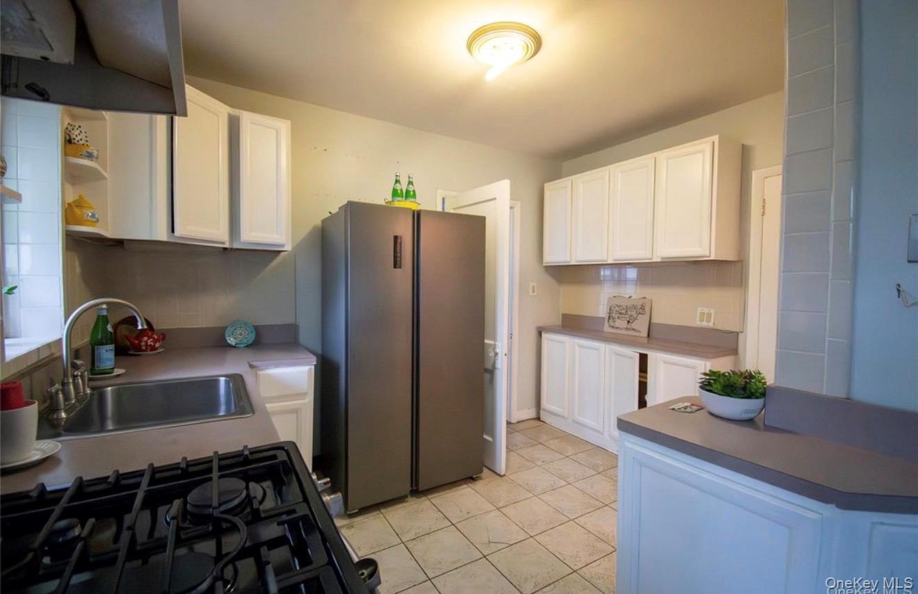 #11 photo, 76 Henry Street, ナッソー郡 Roosevelt , NY 11575