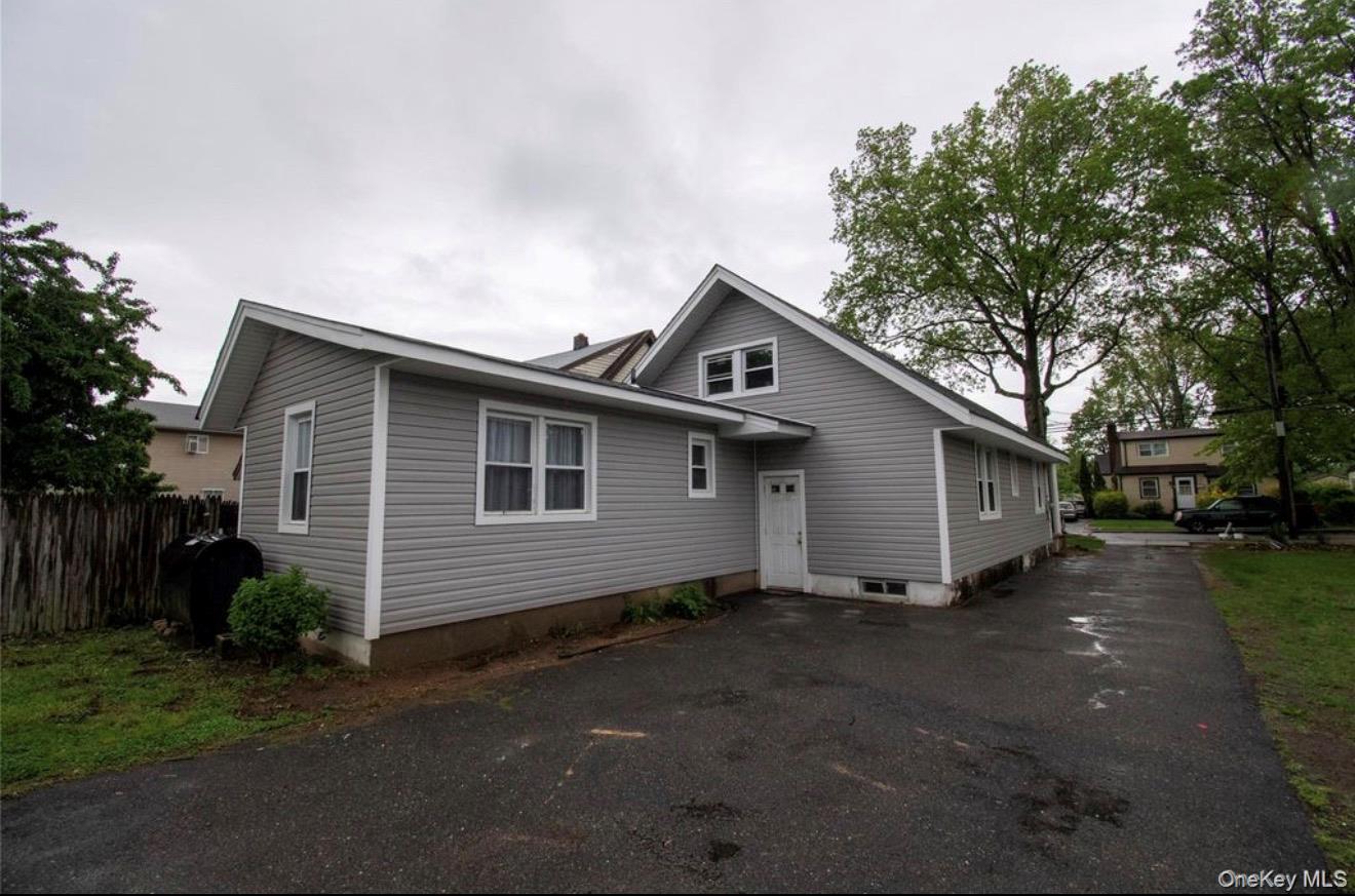 #14 photo, 76 Henry Street, ナッソー郡 Roosevelt , NY 11575