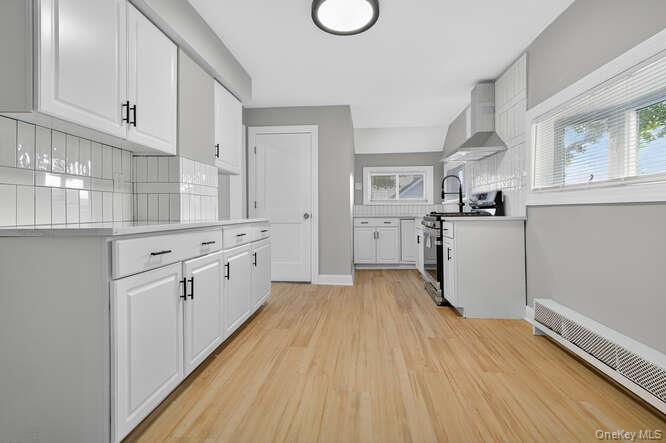 #11 photo, 201 Jamaica Boulevard, Carle Place , NY 11514