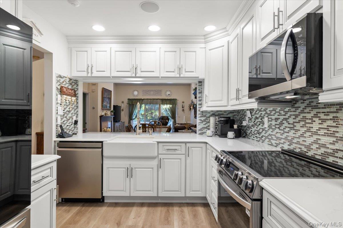 #8 photo, 8 Scarborough Drive, サフォーク郡 Smithtown , NY 11787