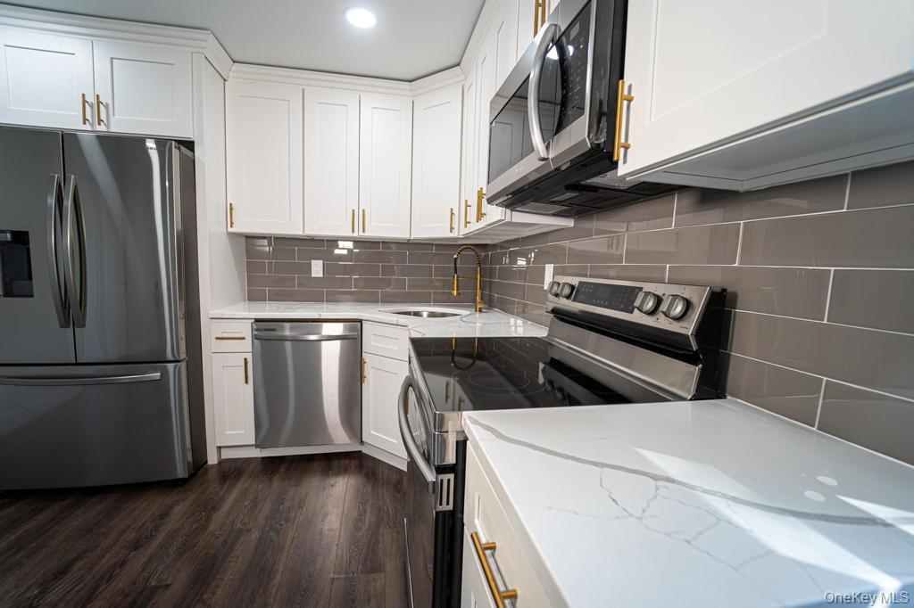 #4 photo, 174 Woodycrest Drive, サフォーク郡 Farmingville , NY 11738