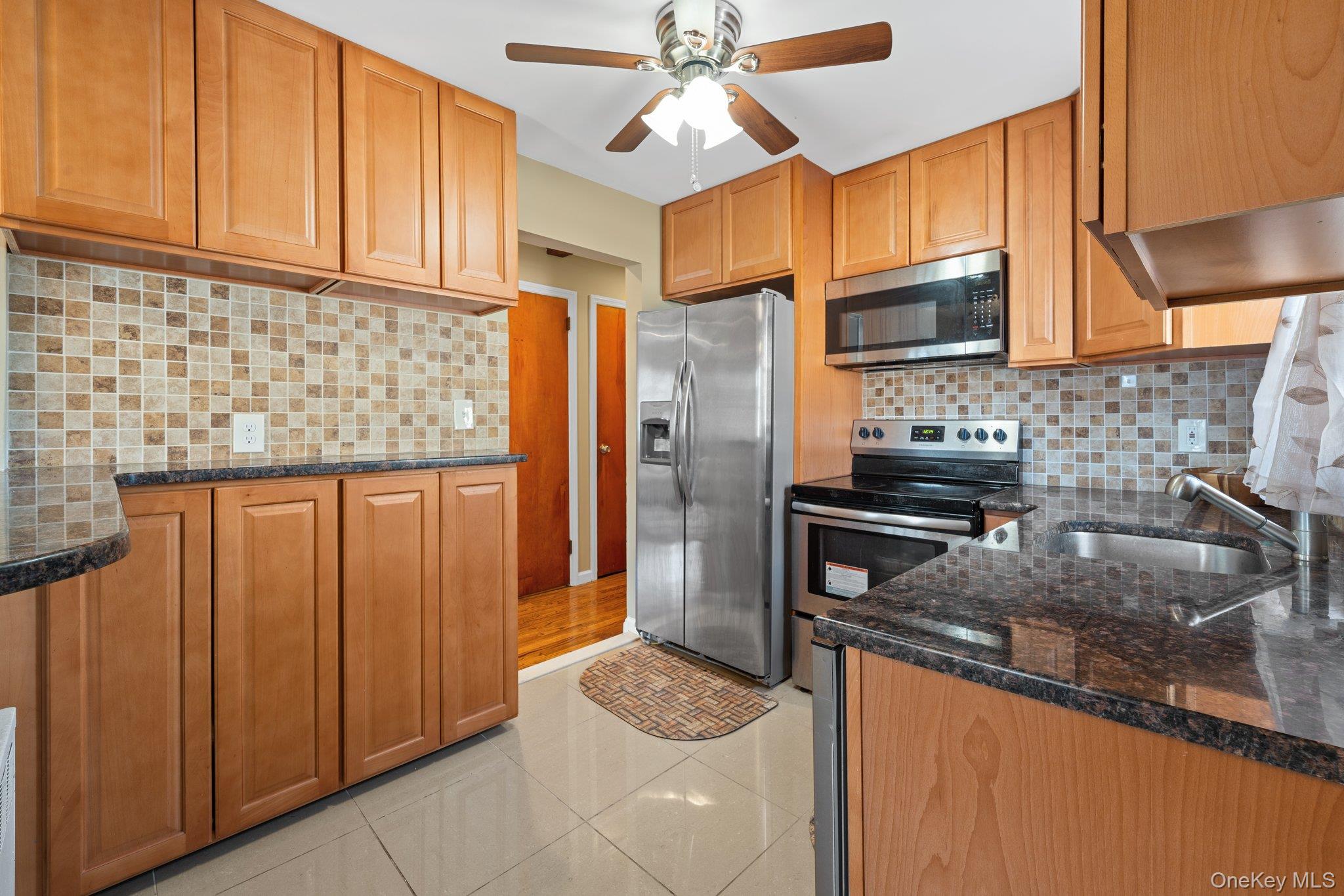 #14 photo, 310 Miller Avenue, ナッソー郡 Freeport , NY 11520